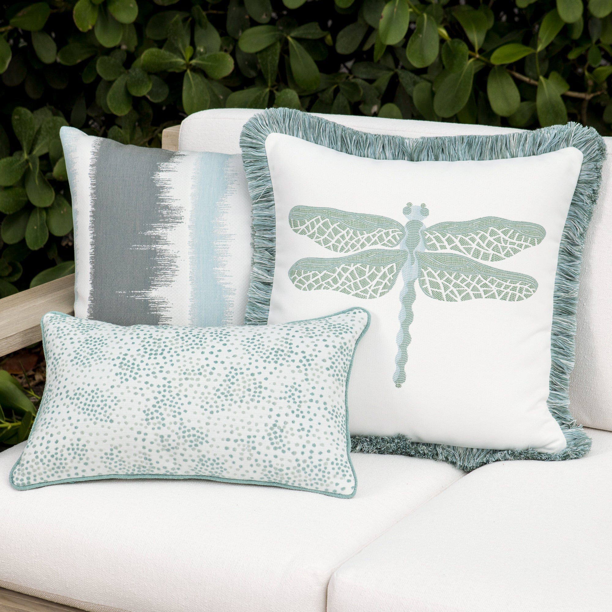 Luxury blue two tone cushion on a rooftop seating area, featuring tailored seams for a polished look to complete indoor and outdoor decor by Elaine Smith