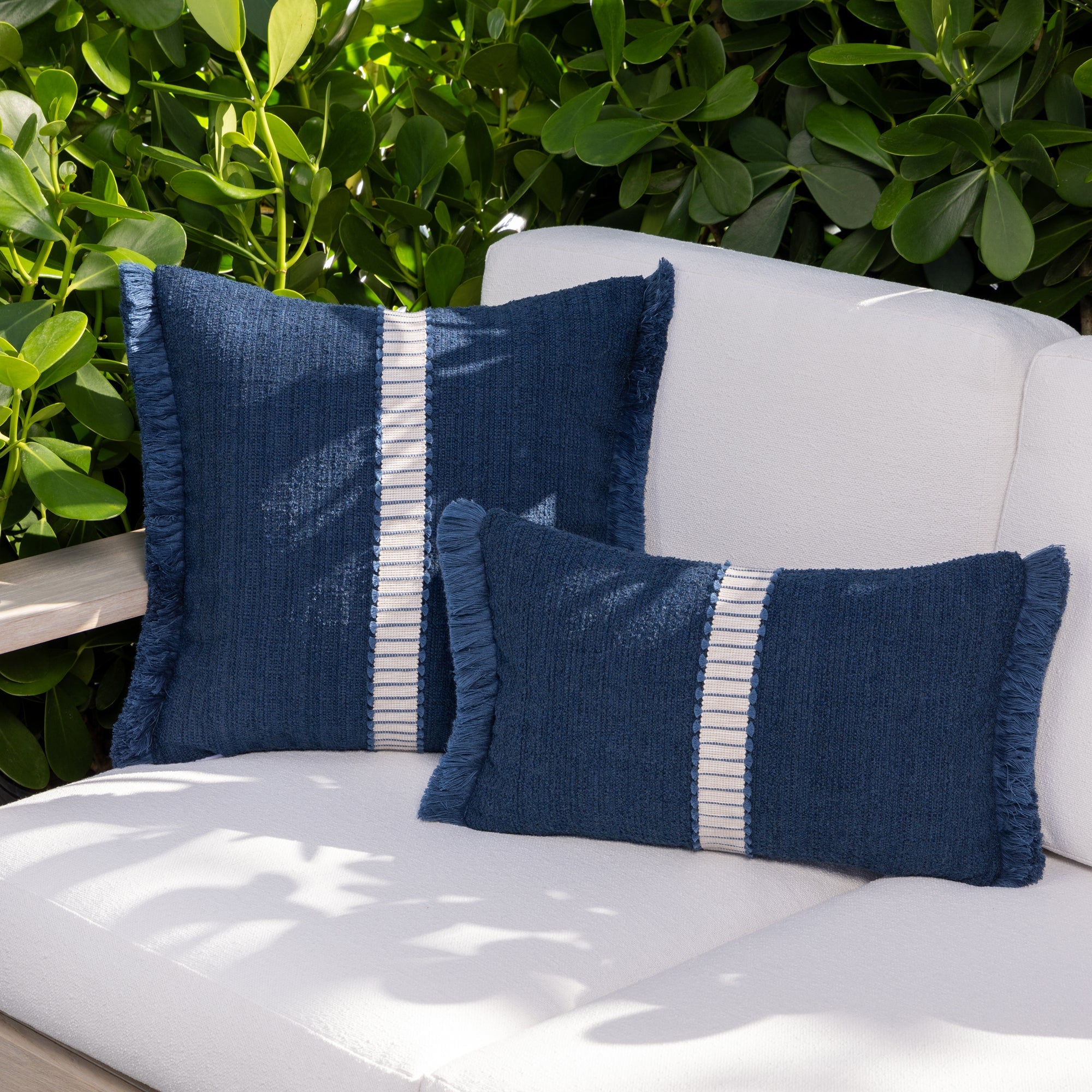 Outdoor image of pillows in Solid indigo outdoor safe performance fabric with plush woven finish - Deluxe Indigo by Elaine Smith