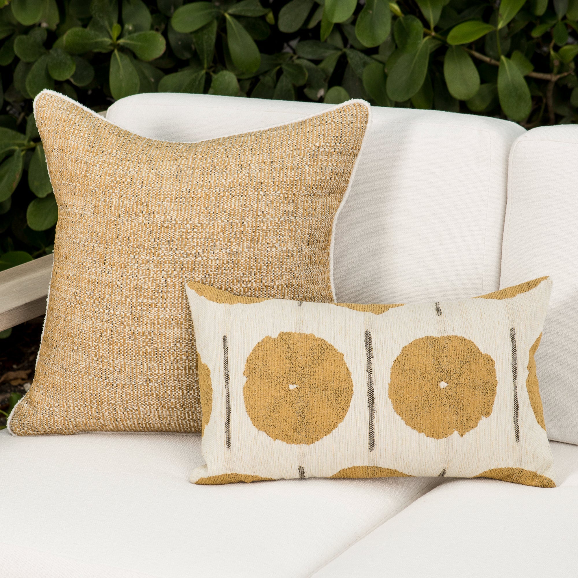 Outdoor image of pillows in Warm golden-toned woven outdoor safe fabric with rich texture – Golden Hour by Elaine Smith