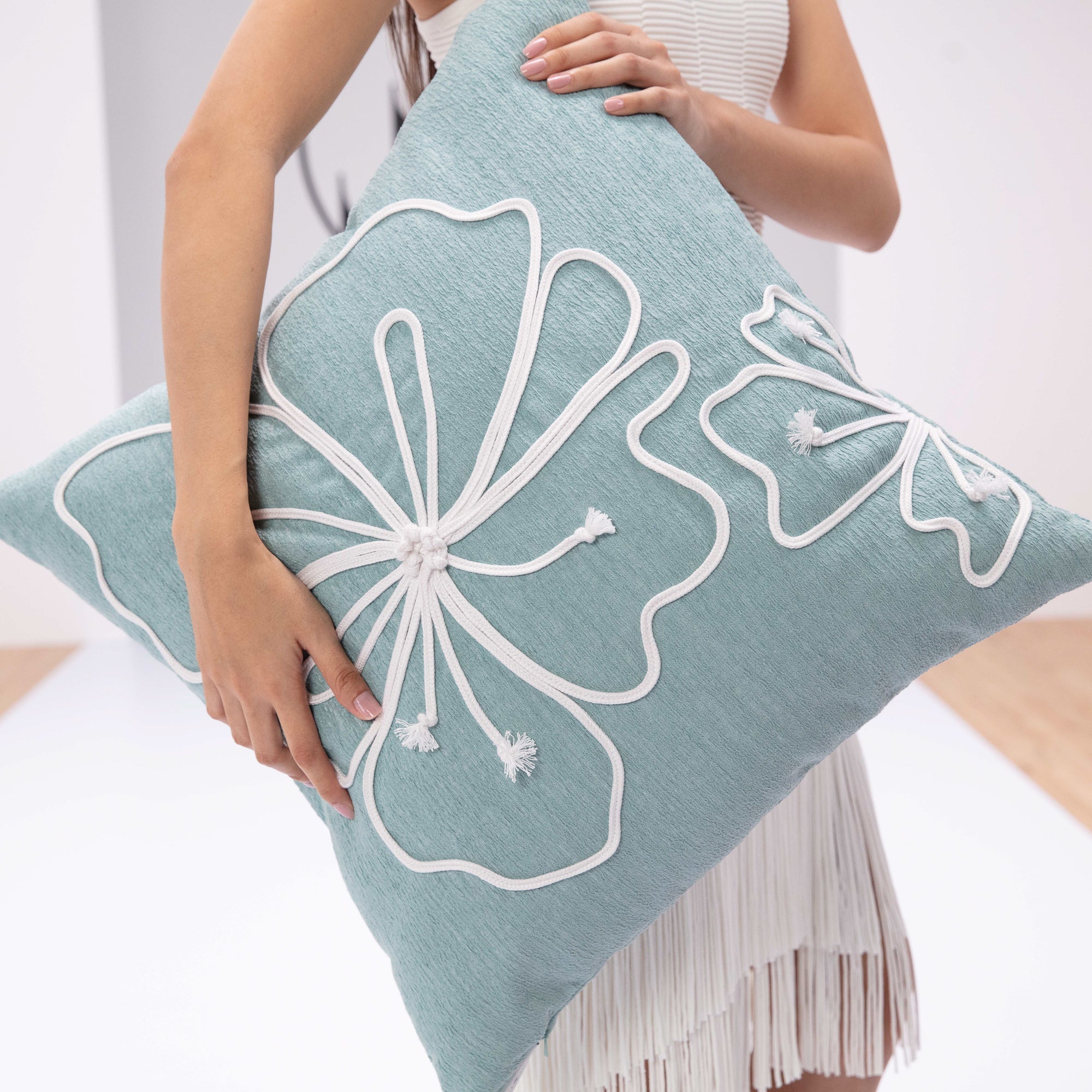 closeup shot of hibiscus mist hand appliqued pillow by elaine smith