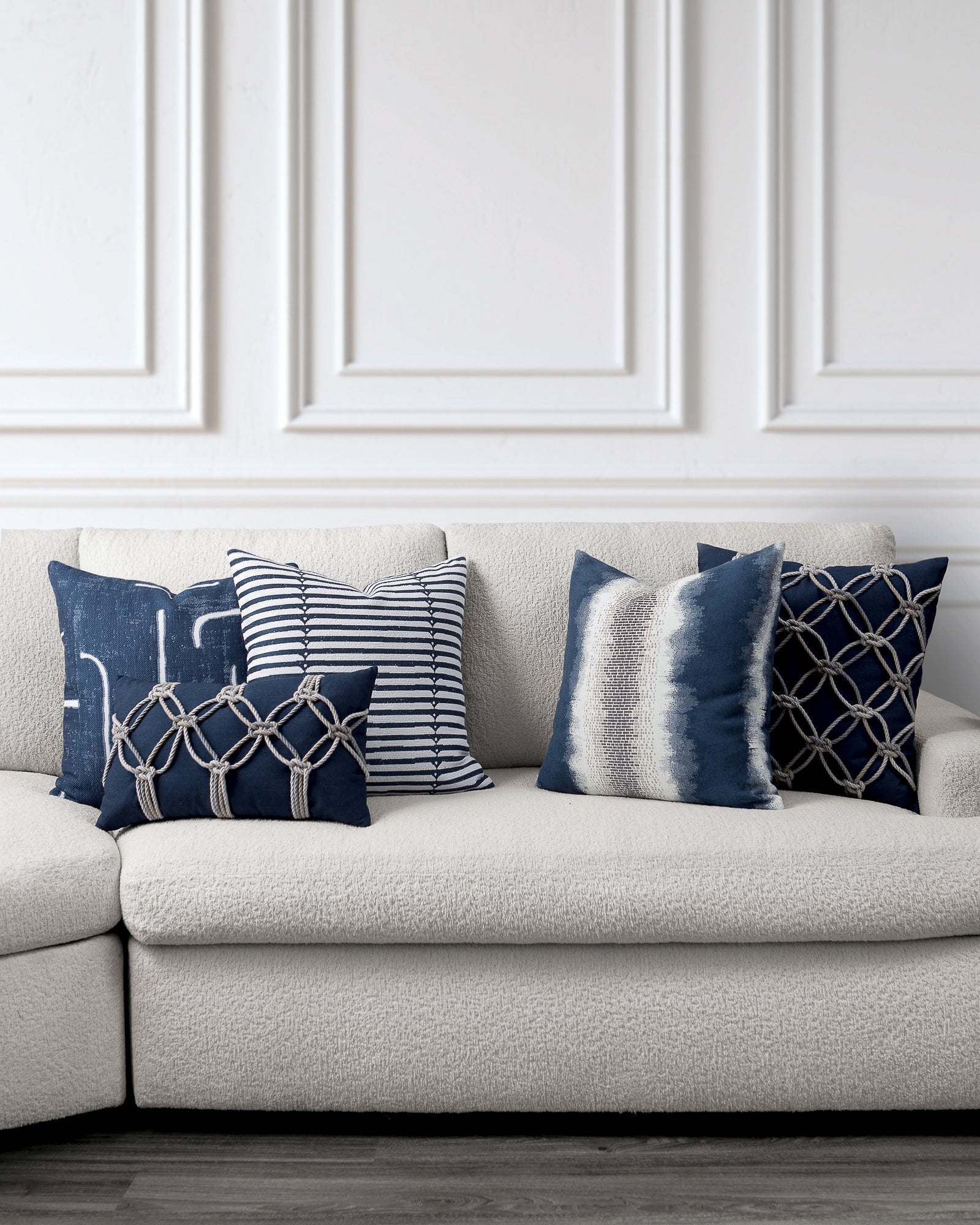 indoor environmental image of denim blue coordinated pillow group by Elaine 