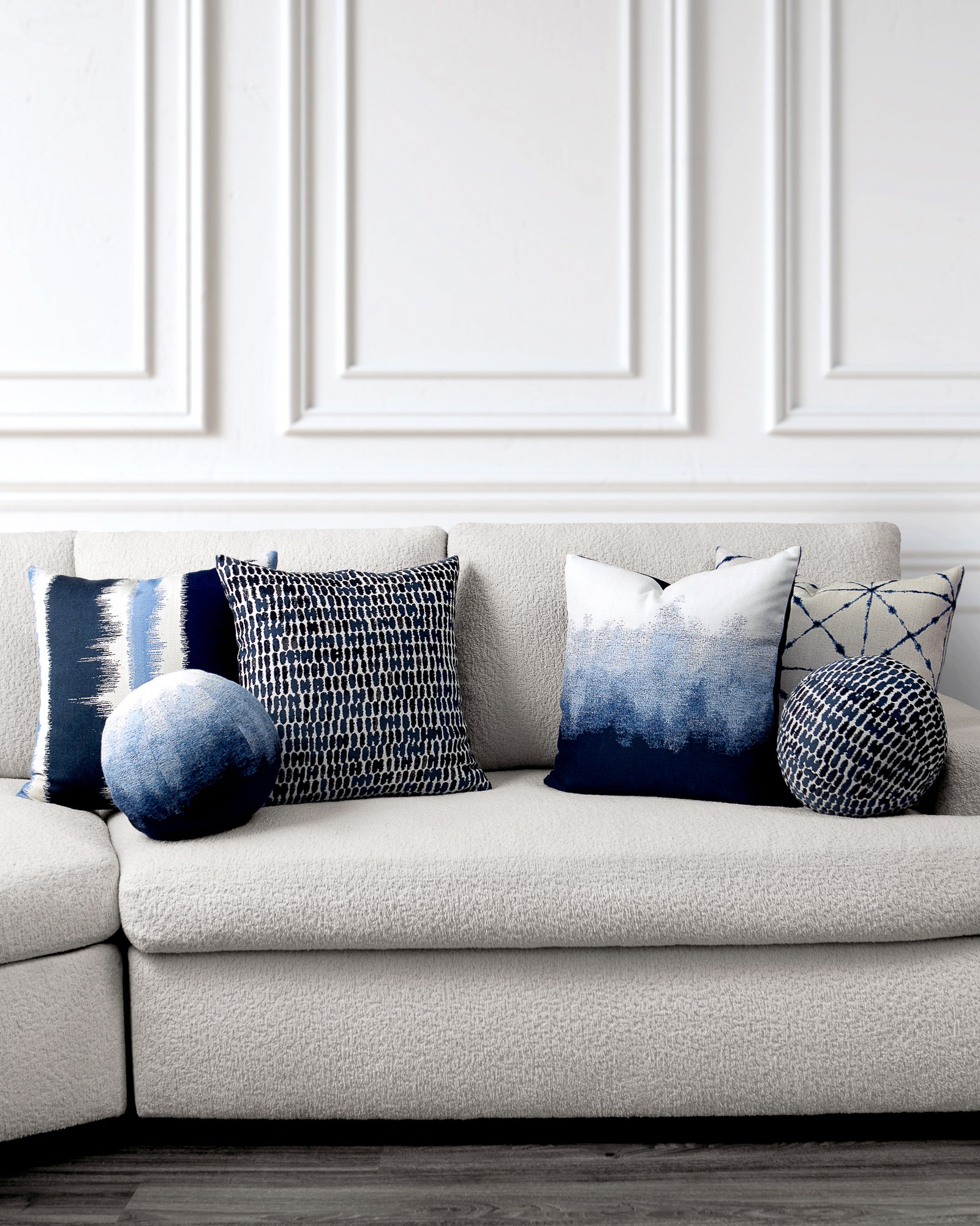 indoor environmental image of indigo coordinated pillow group by Elaine Smith