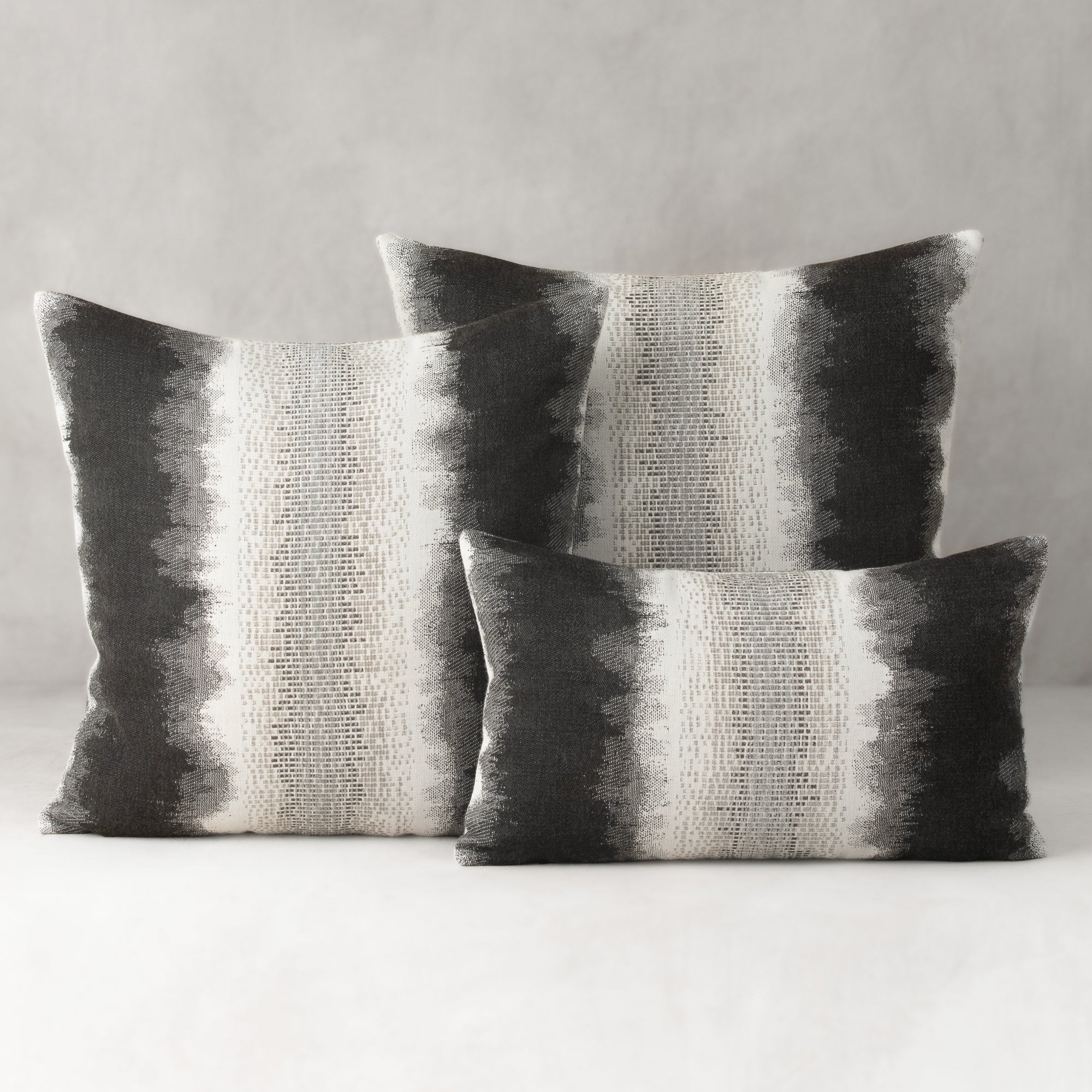 ombre striped pillows in charcoal gray with chenille center band
