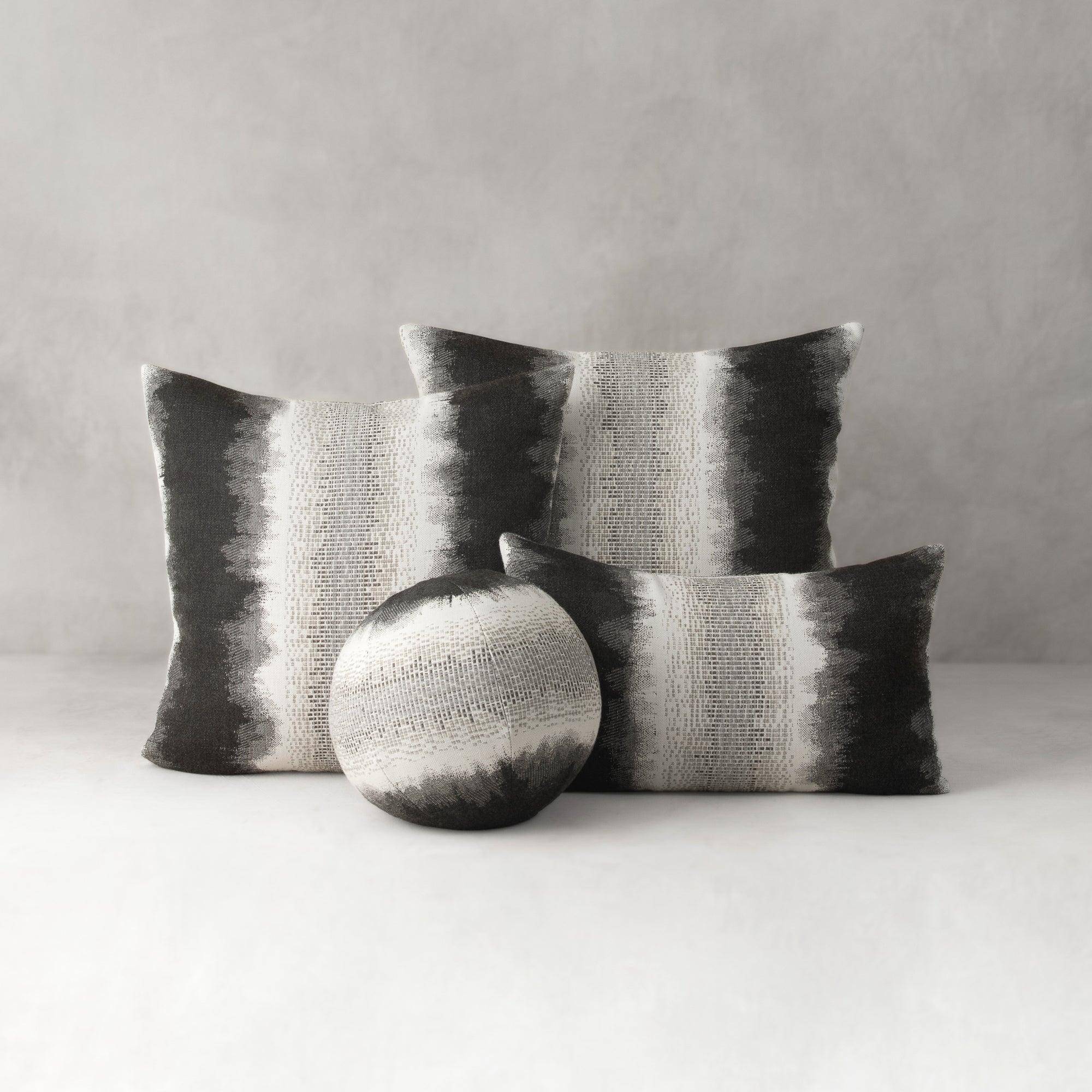 ombre striped pillows in charcoal gray with chenille center band
