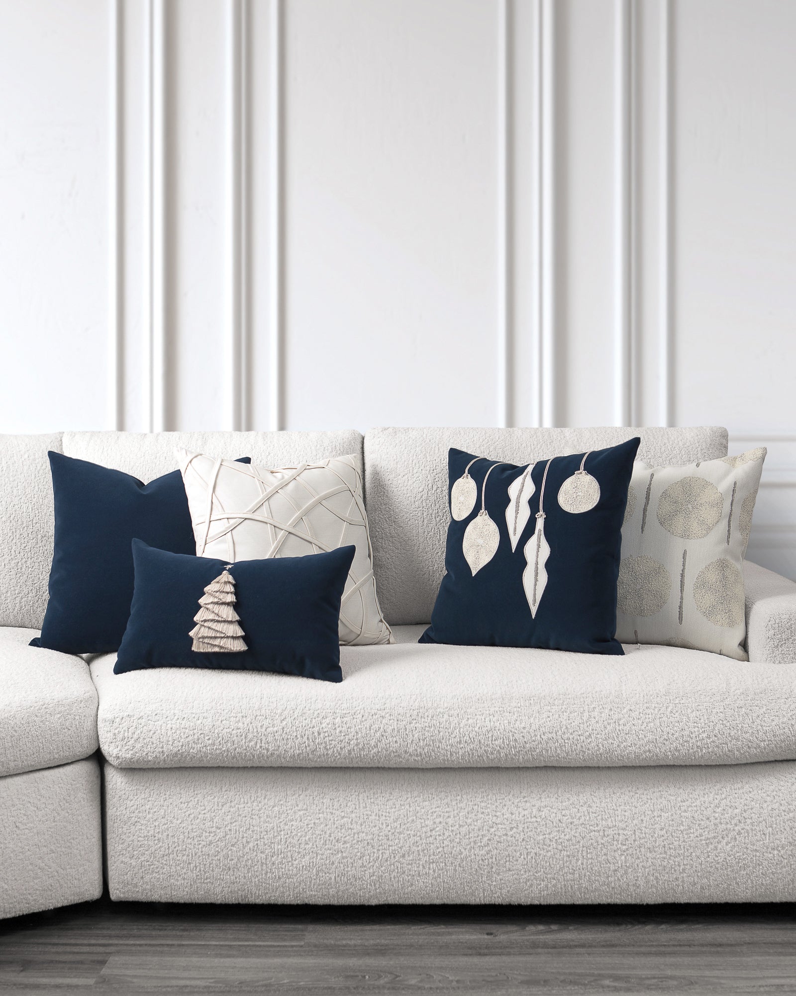 indoor environmental image of midnight blue and ivory starlight holiday pillow group by Elaine Smith