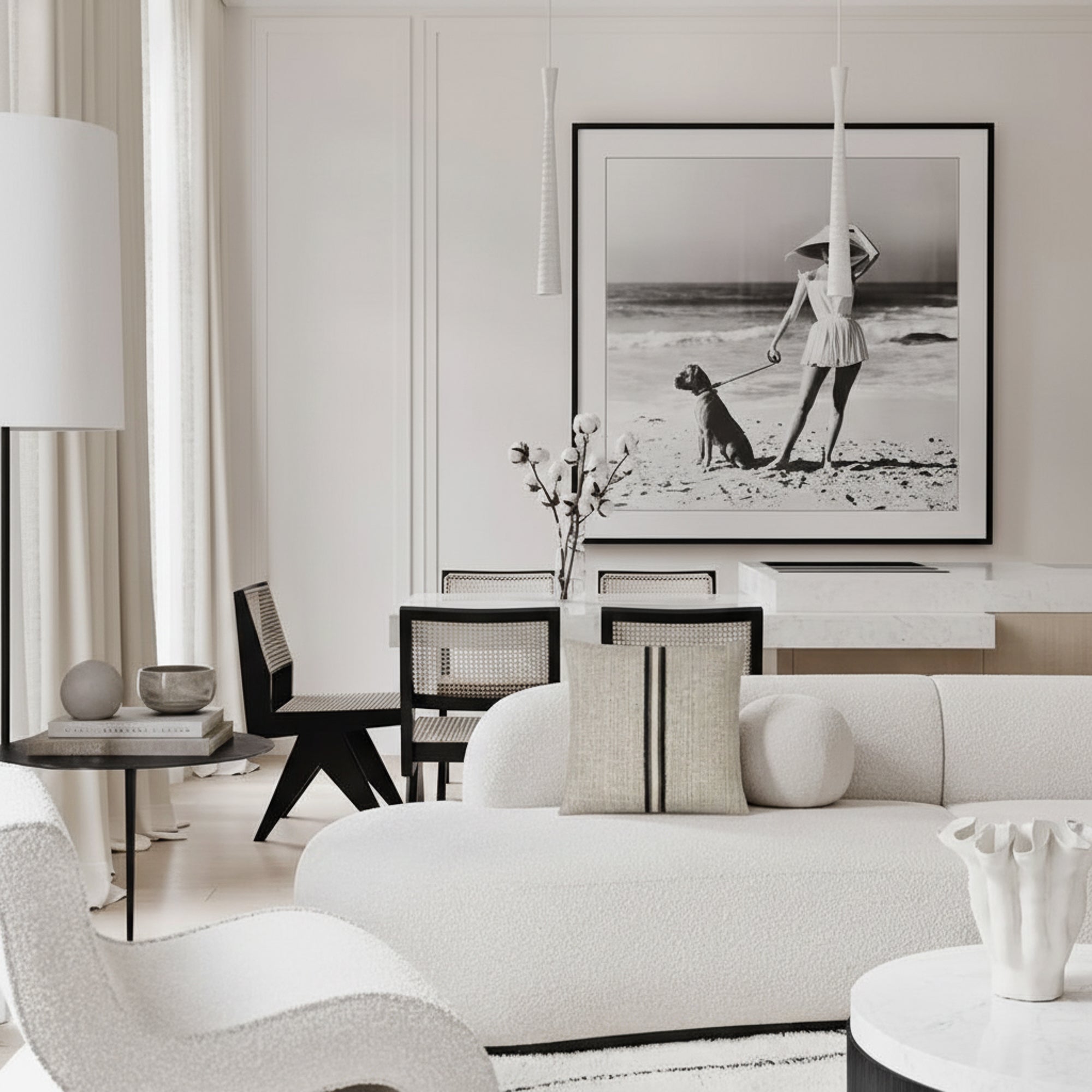 ivory woven pillow with charcoal fringe center band on indoor modern sofa