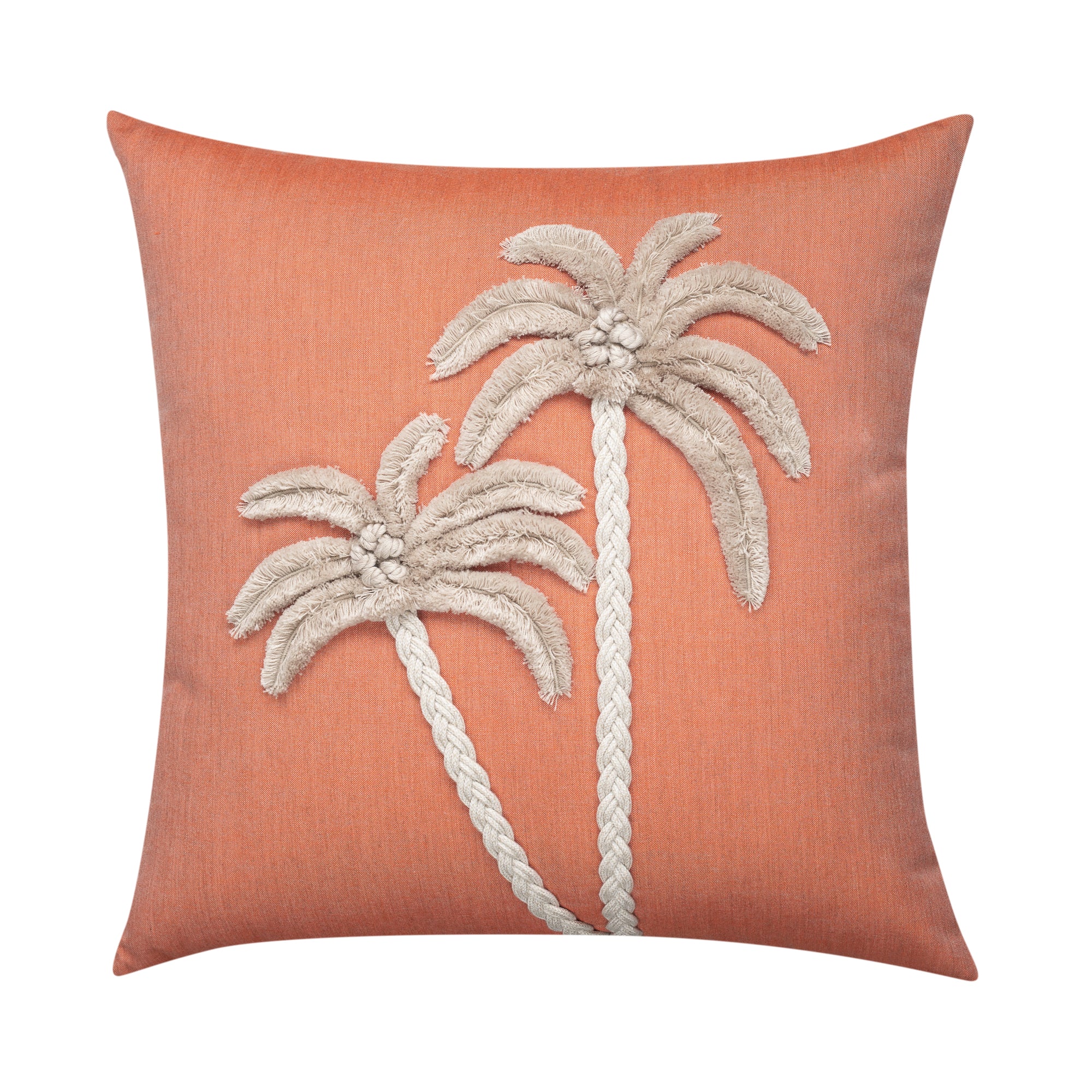 Pillow with embroidered palm trees on a coral background
