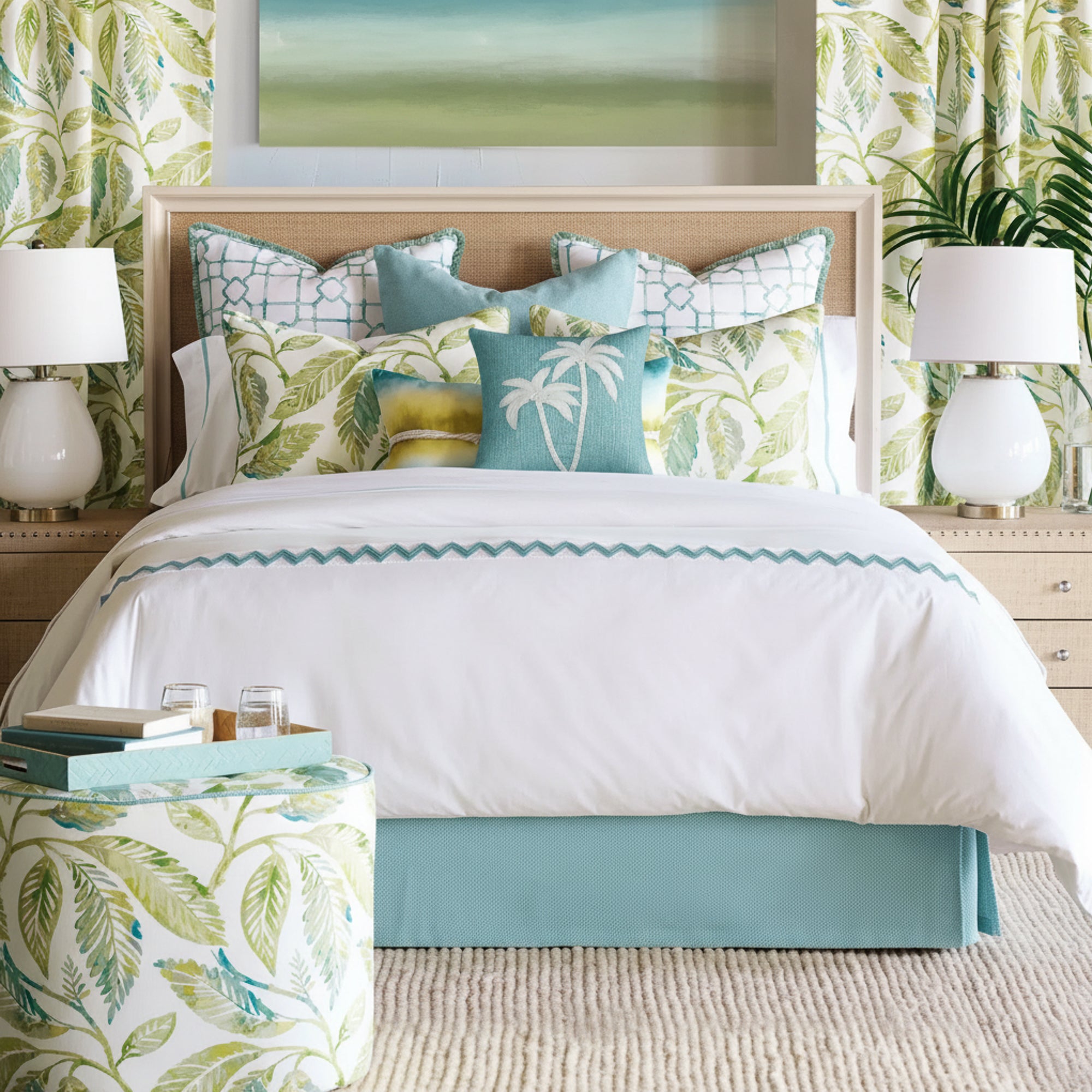 hand sewn palm tree pillow on fresh leafy bedroom scene