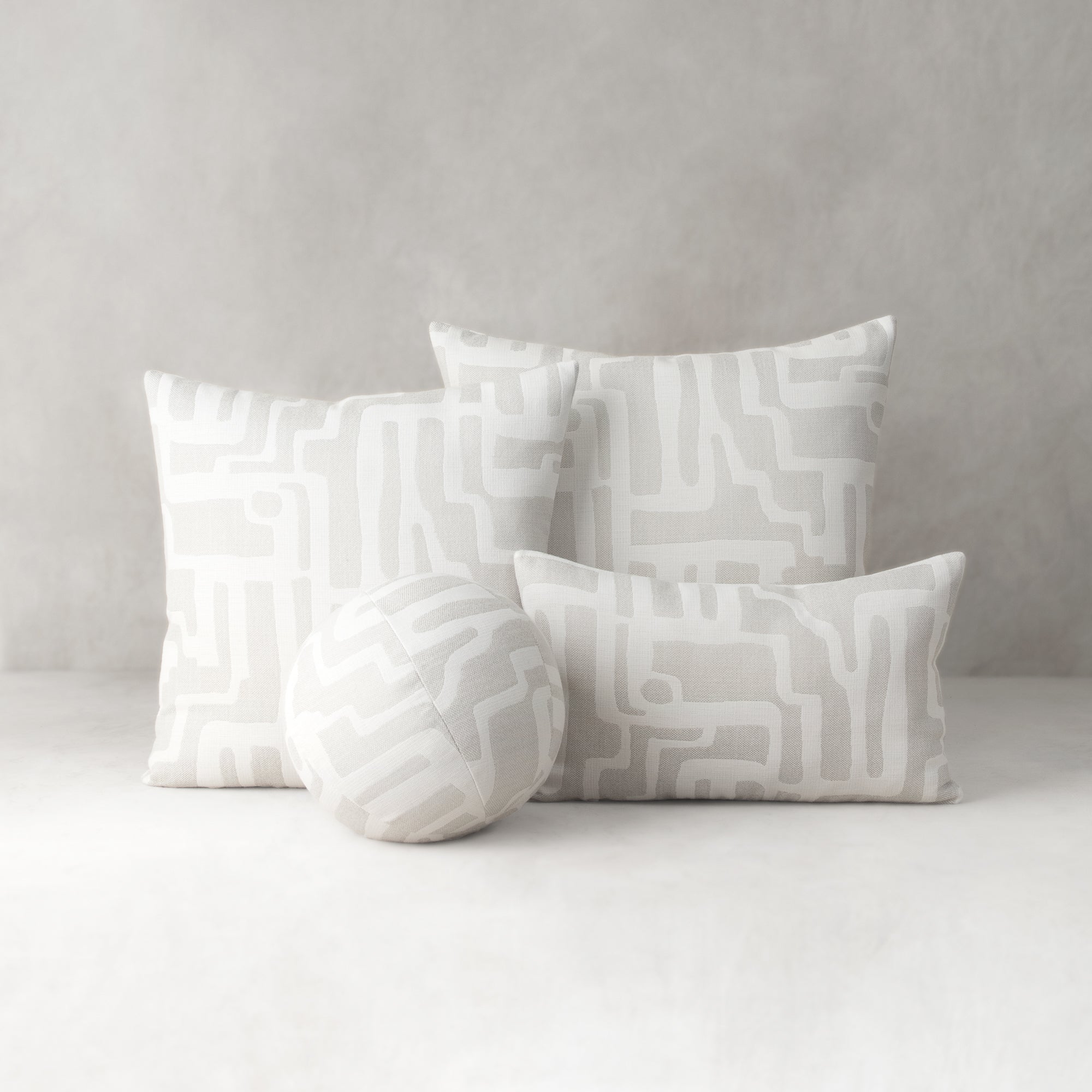 Set of white patterned pillows on a light gray background - outdoor safe by Elaine Smith