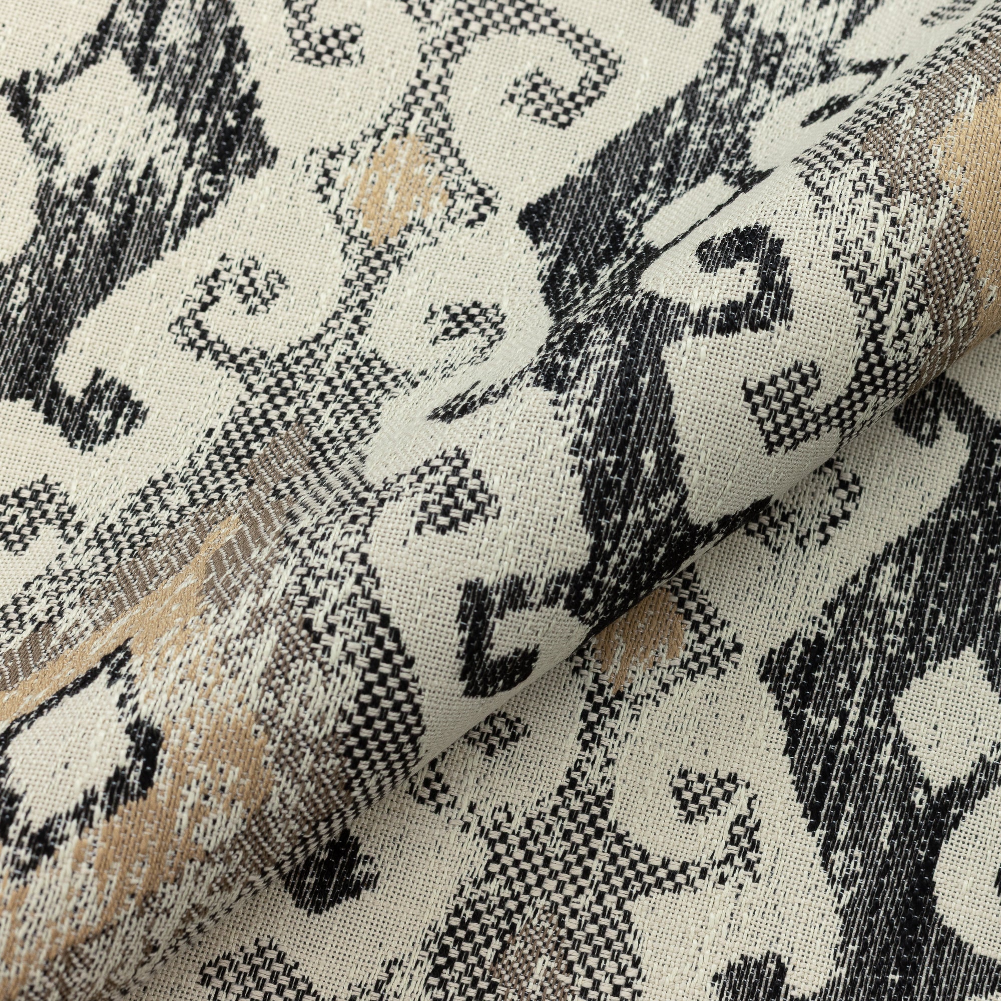 Close shot texture image of Decorative honey-toned outdoor-safe fabric with ethnic-inspired motif