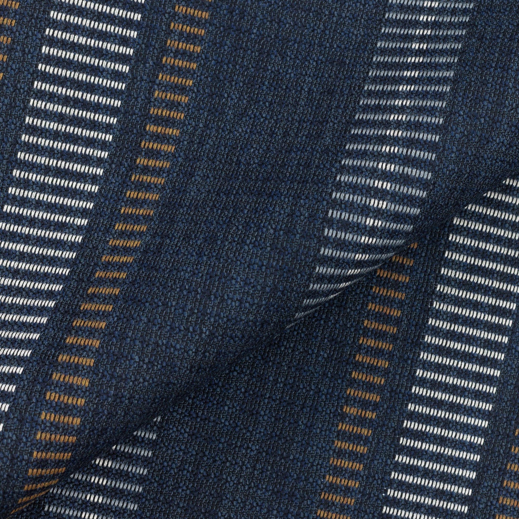 Close shot texture image of Striped indigo outdoor safe fabric with rich earth-tone accents – Journey Indigo by Elaine Smith