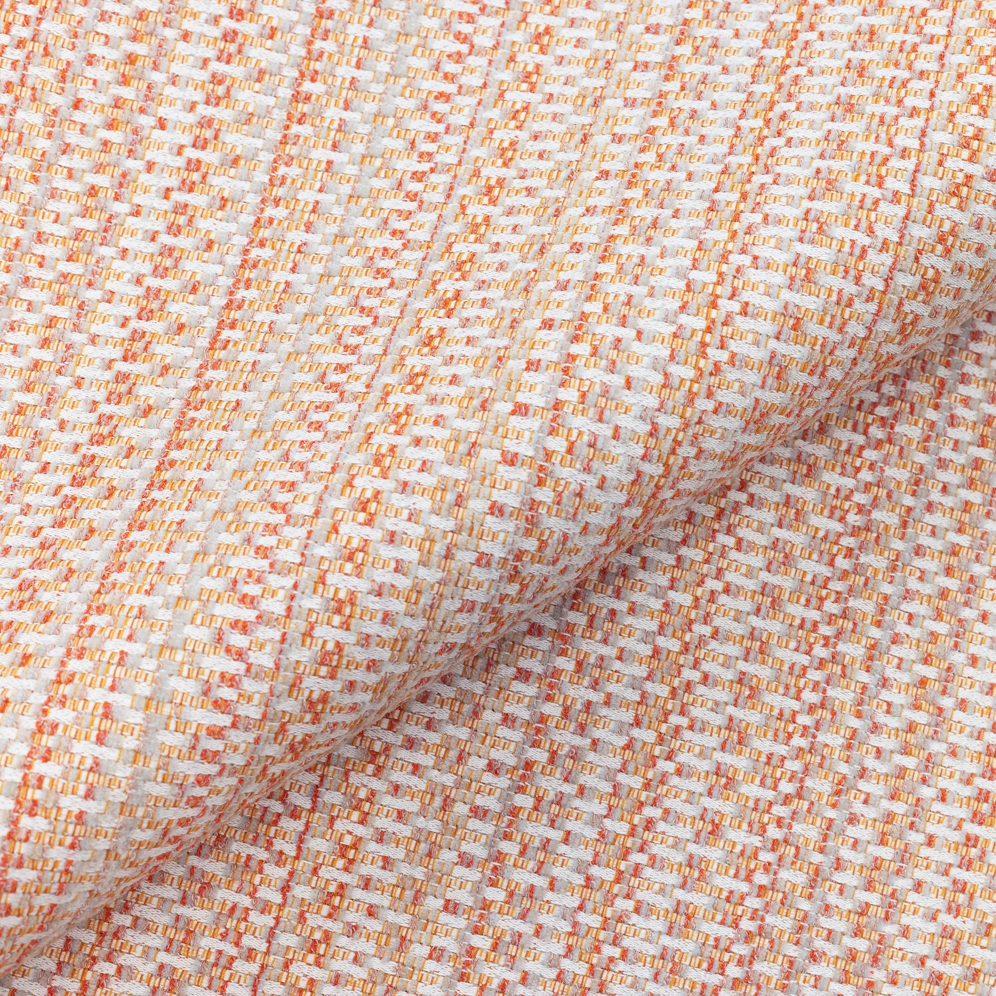 Close shot texture image of Kaleidoscope Clay – outdoor-safe multi-colored chenille woven fabric by Elaine Smith, ideal for high-end commercial and residential applications.