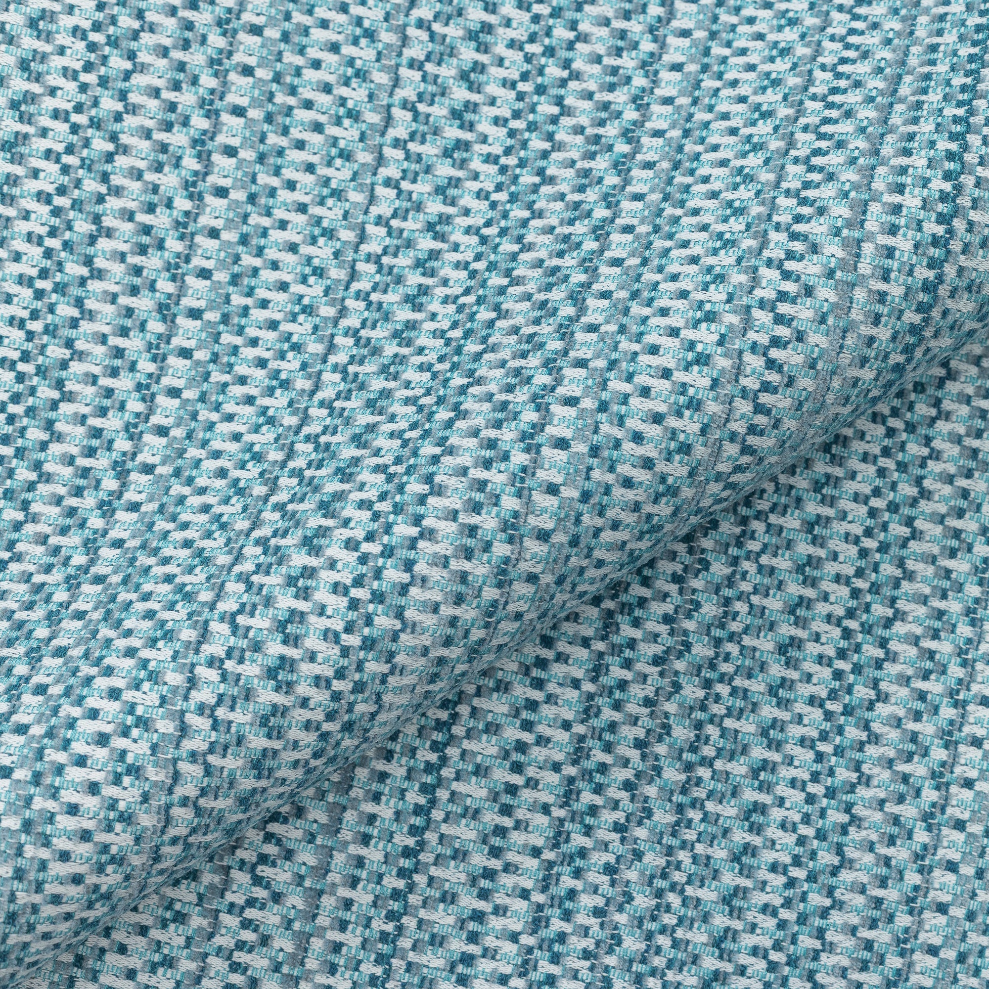Close shot texture image of Lagoon blue multi-colored chenille kaleidoscope pattern outdoor safe woven fabric