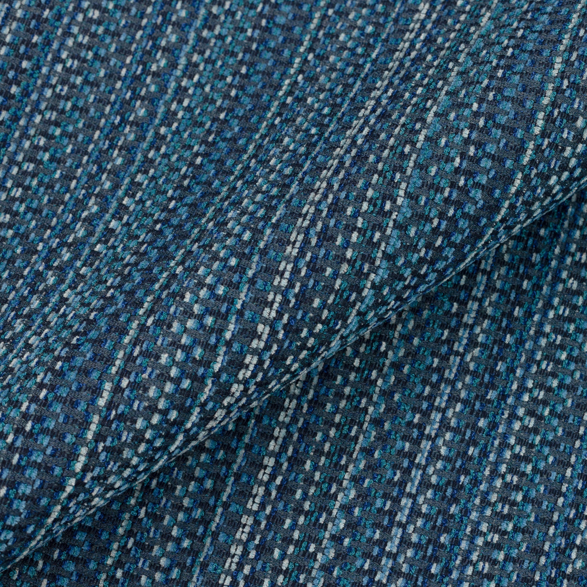 Close shot texture image of Midnight blue multi-colored chenille kaleidoscope pattern outdoor-safe woven fabric – Kaleidoscope Midnight by Elaine Smith