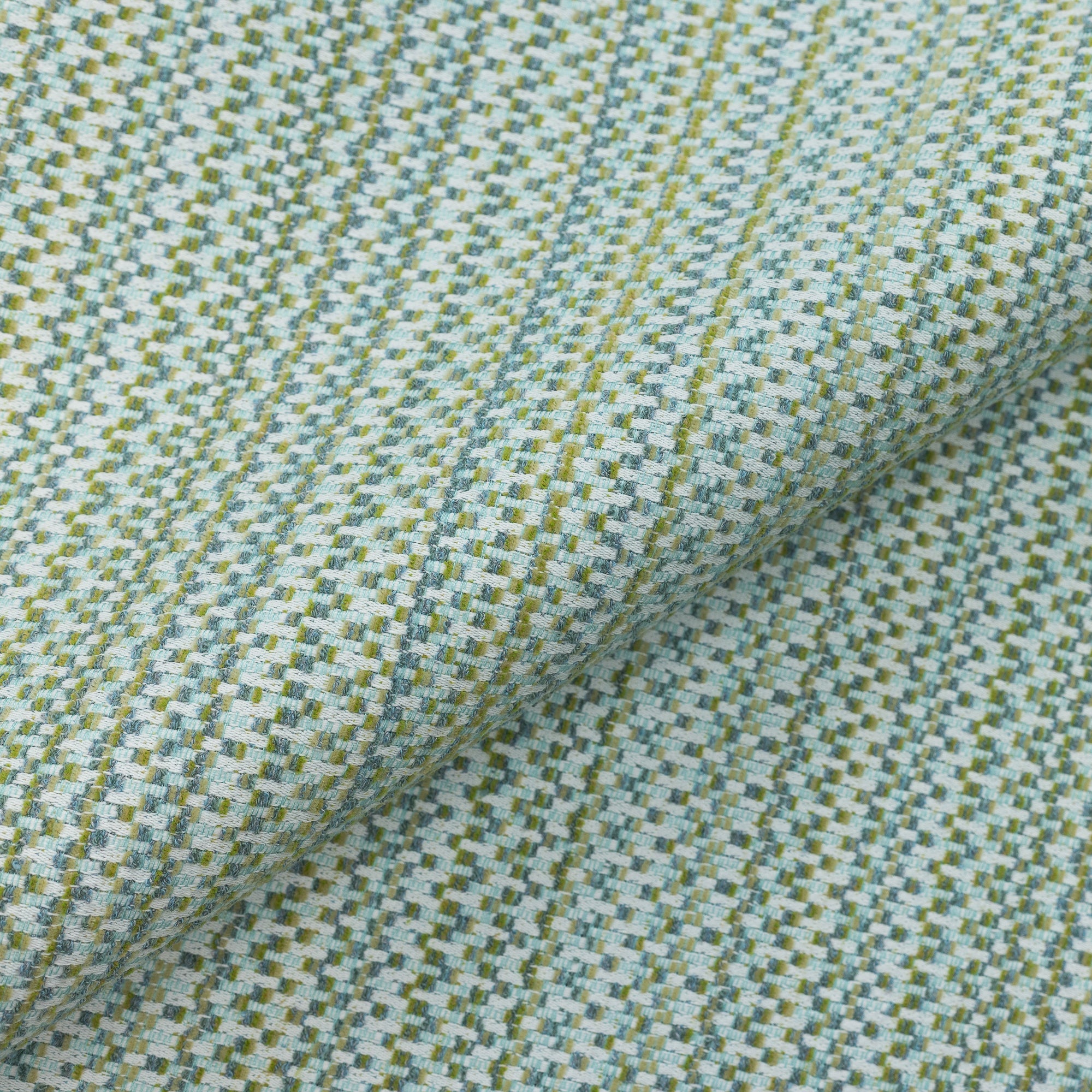 Close shot texture image of Outdoor safe multi-colored chenille woven fabric with colorful geometric pattern in spring tones