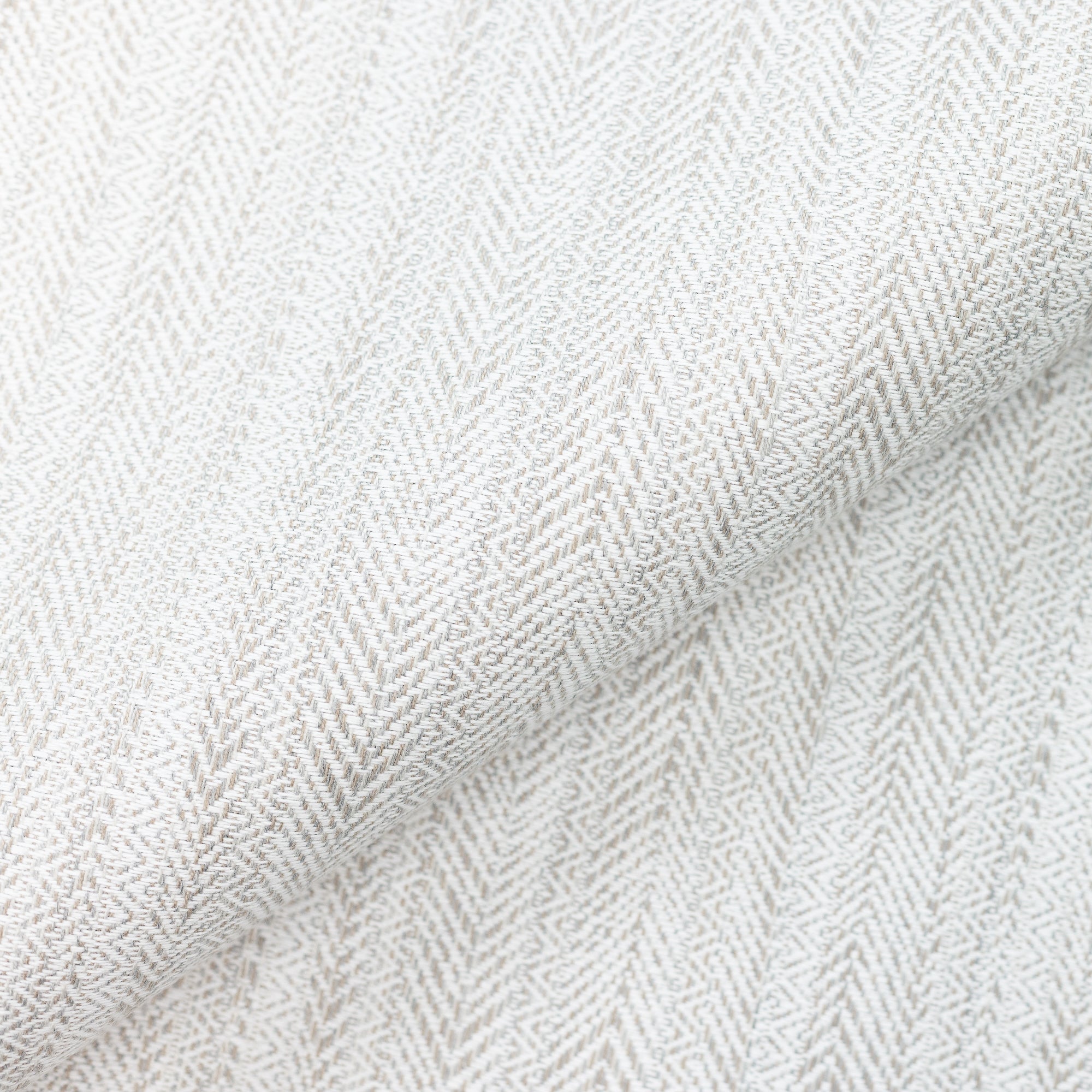 Close shot texture image of Kente Pebble – outdoor-safe woven fabric by Elaine Smith, ideal for high-end commercial and residential applications.