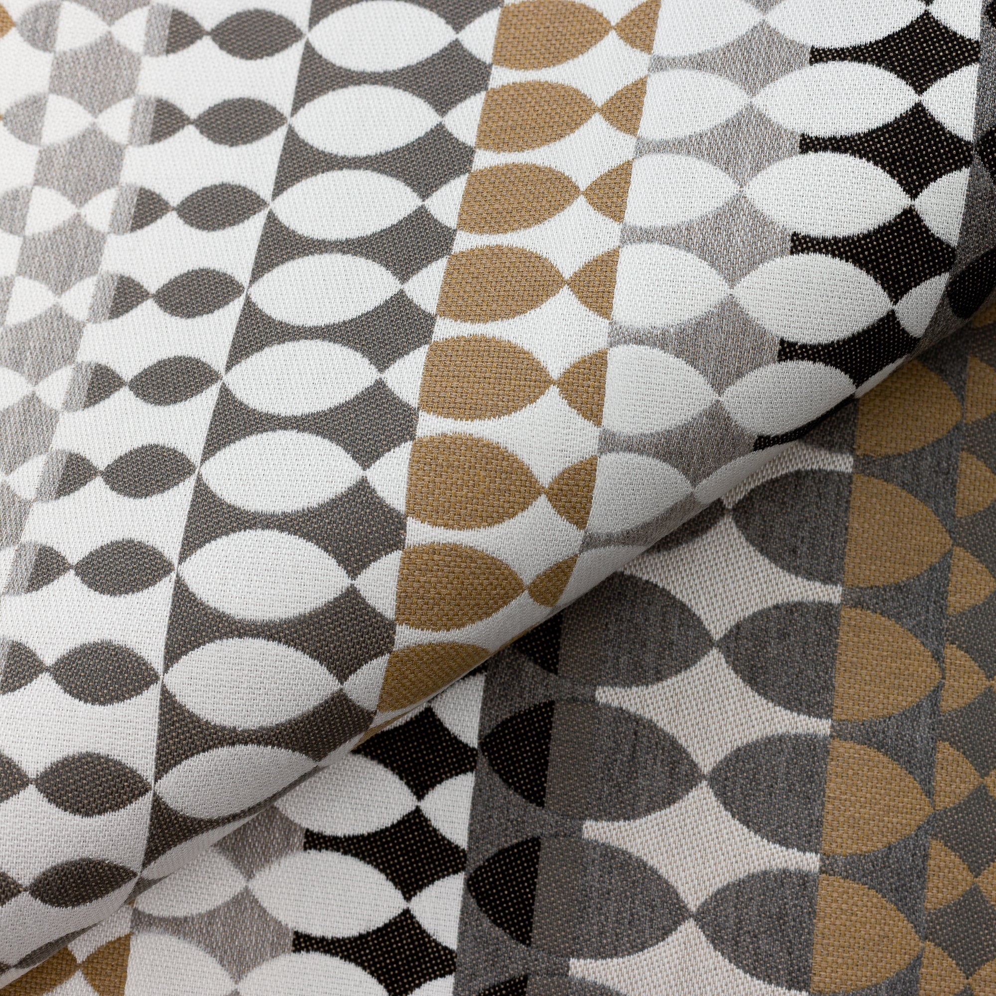 Close shot texture image of Modern Oval Dune – outdoor-safe woven fabric by Elaine Smith, ideal for high-end commercial and residential applications.