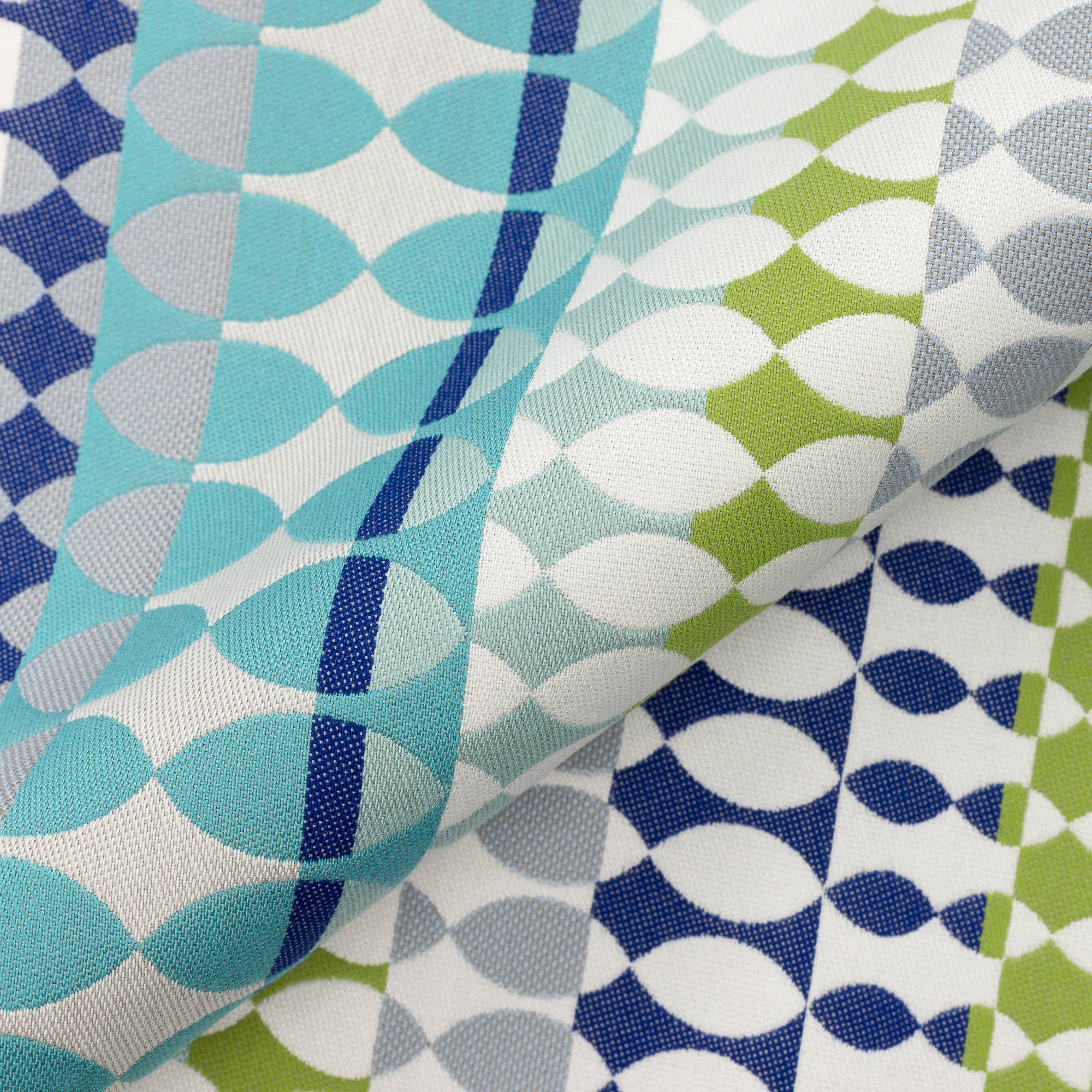 Close shot texture image of Contemporary oval patterned outdoor safe fabric in blue and green