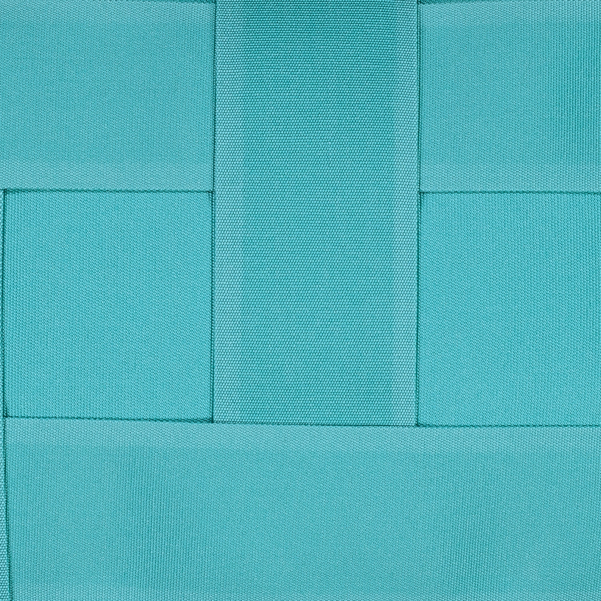 Detail image of Aruba blue outdoor pillow with solid design for bold outdoor accents