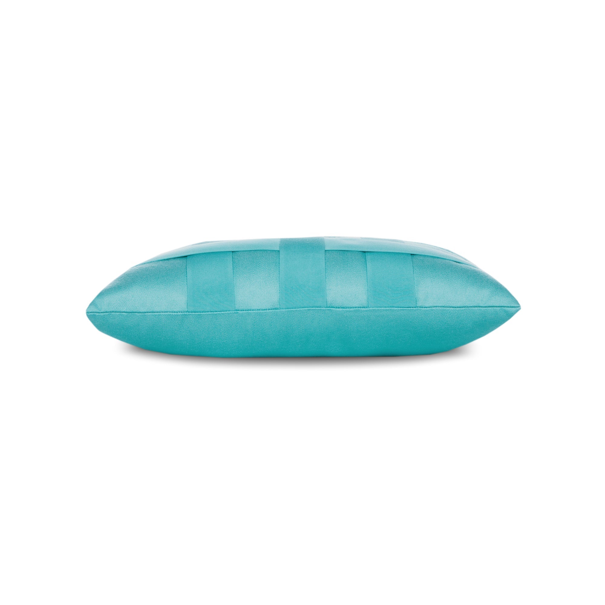 Side image of Aruba blue outdoor pillow with solid design for bold outdoor accents