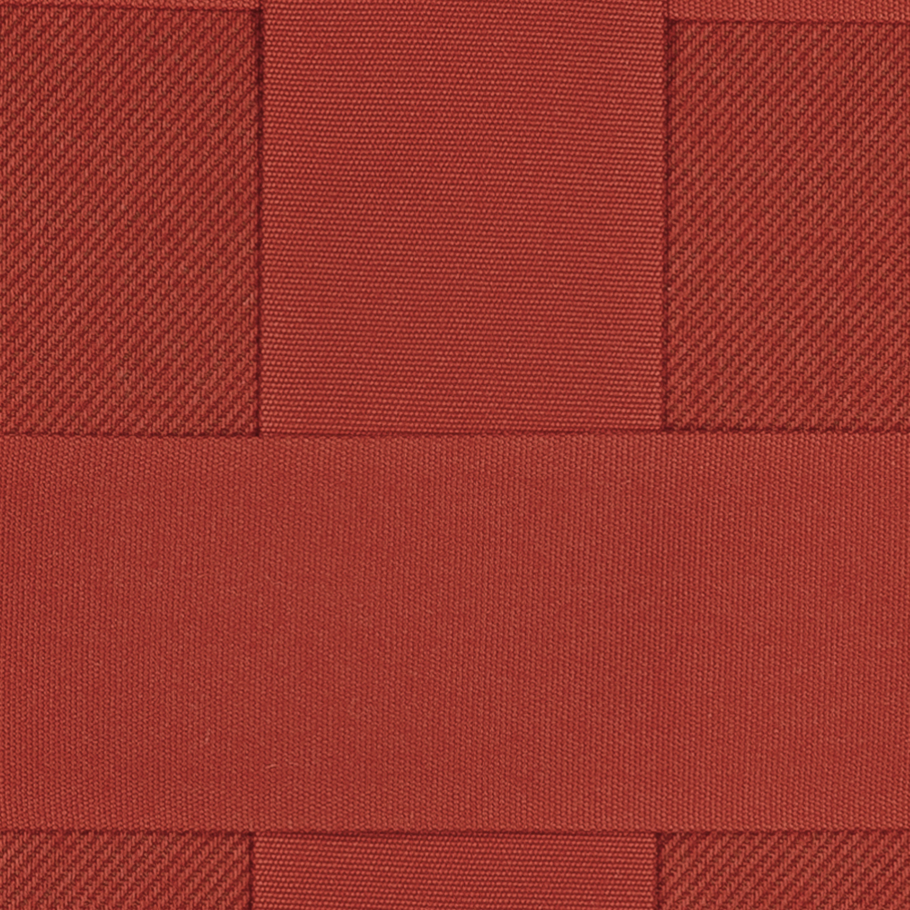 Detail image of Rust red outdoor pillow with solid design for bold outdoor accents