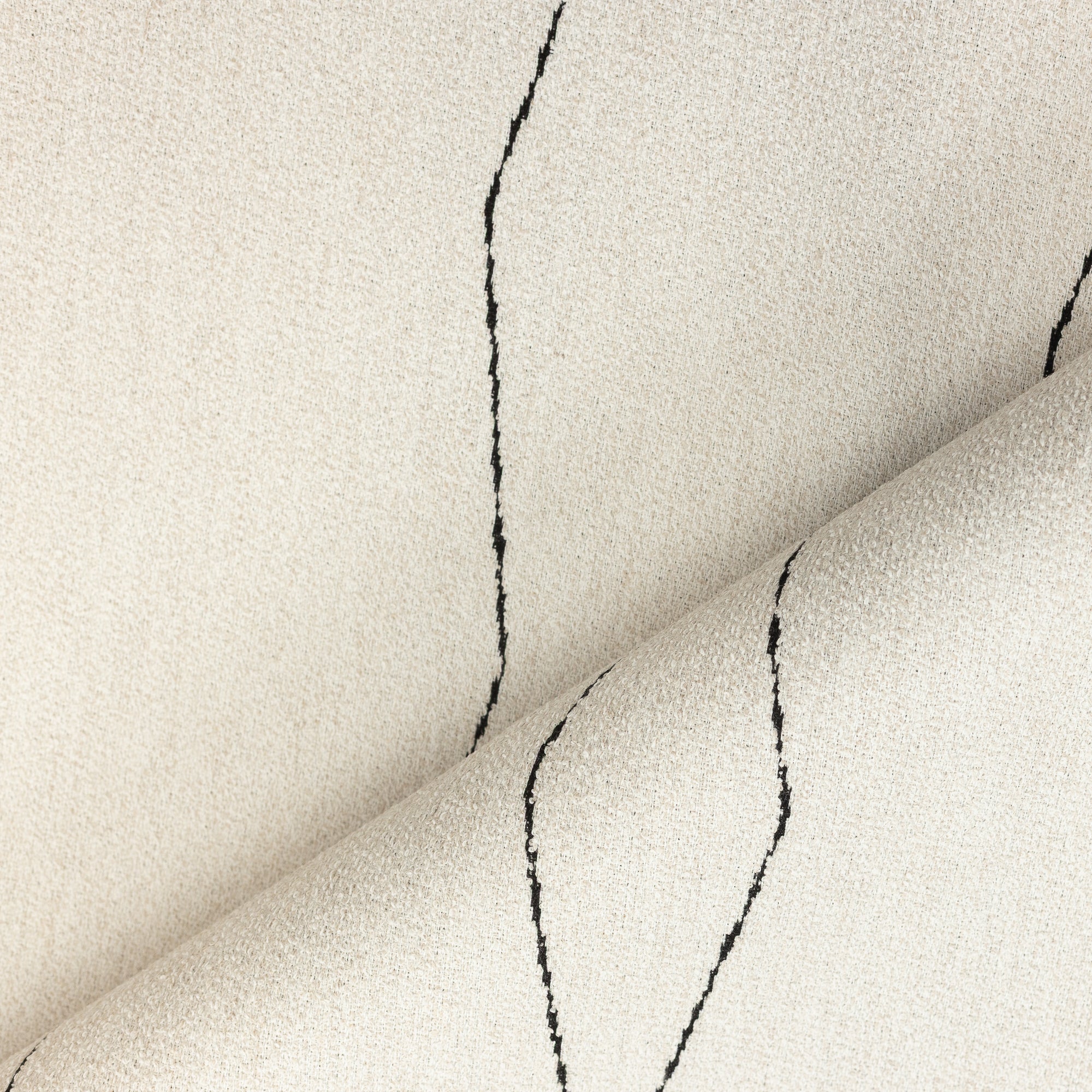 Close shot texture image of Minimalist black linear geometric pattern woven into textured boucle outdoor safe fabric