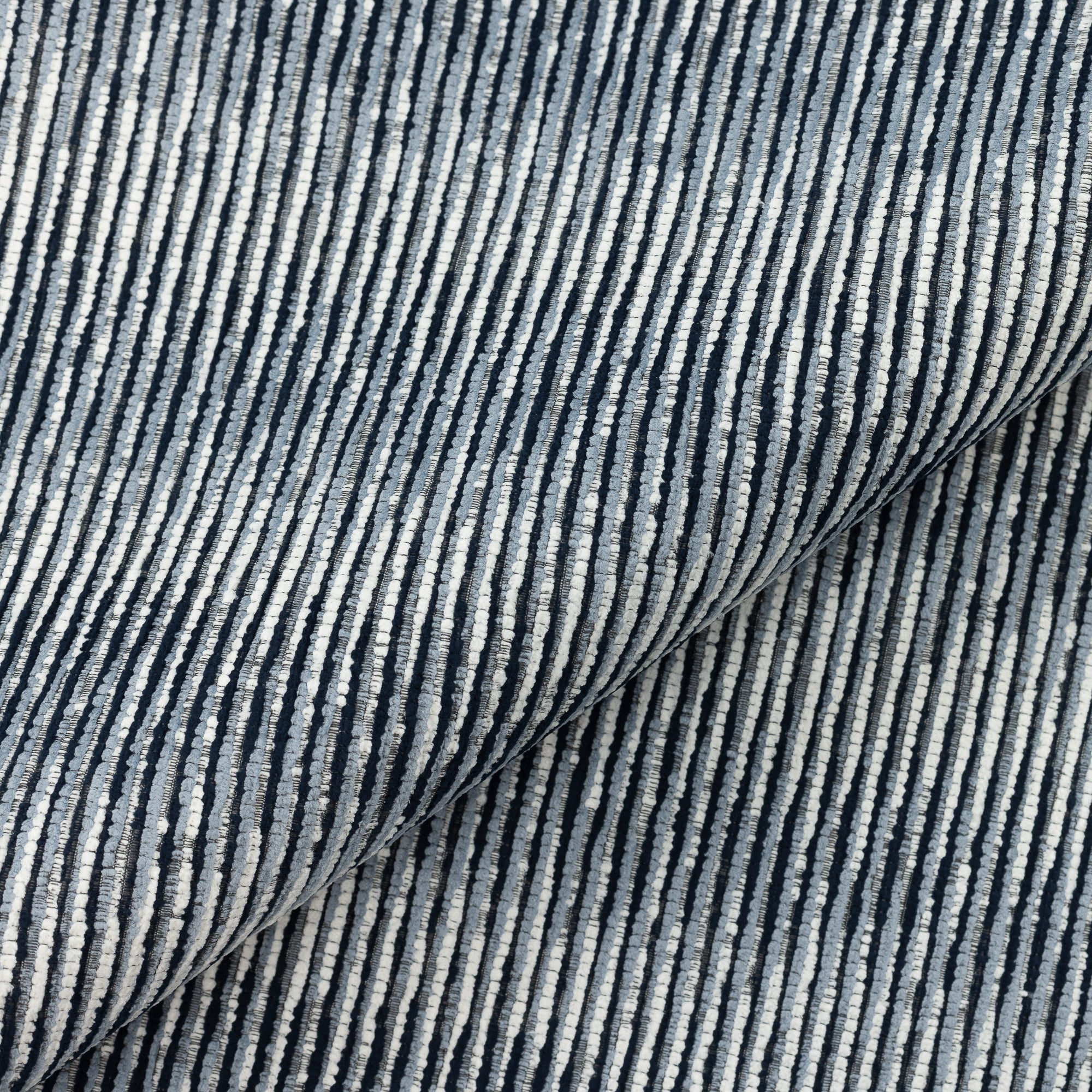 Close shot texture image of Linear indigo outdoor-safe fabric with a soft gradient stripe pattern