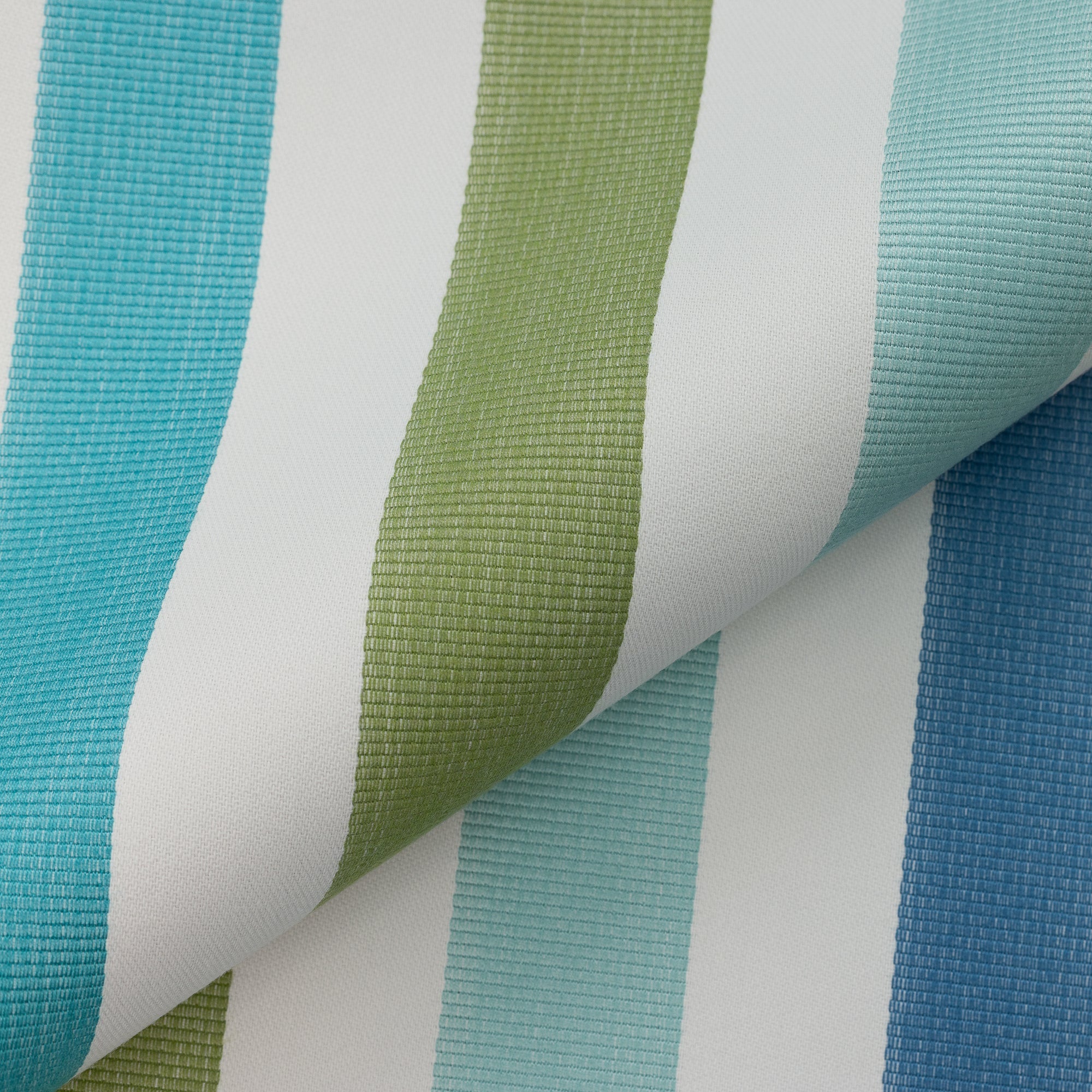 Close shot texture image of Outdoor safe woven fabric with vibrant green, blue, and white stripes – Rhodes Stripe by Elaine Smith