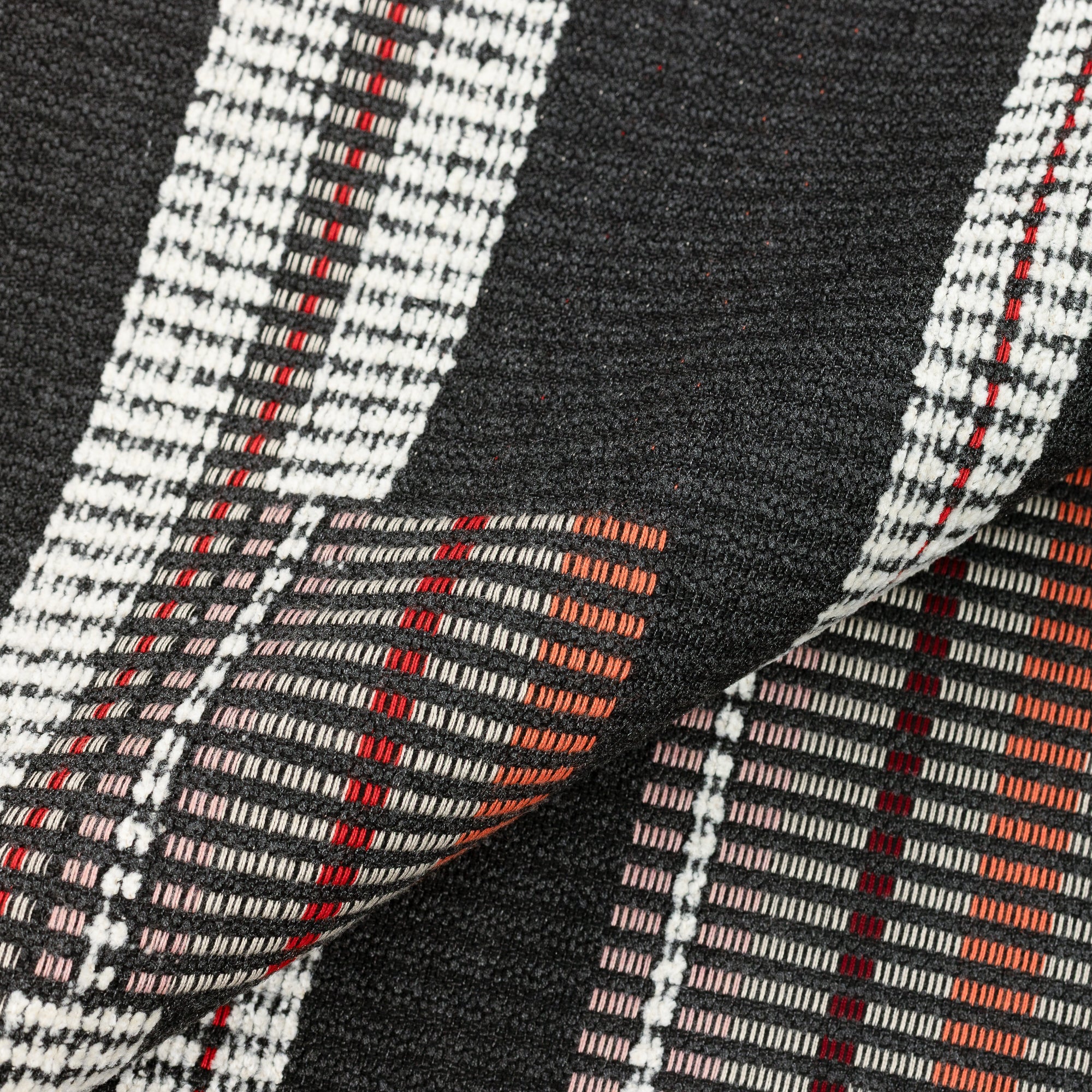 Close shot texture image of Striped charcoal outdoor safe woven fabric with modern texture and contrast