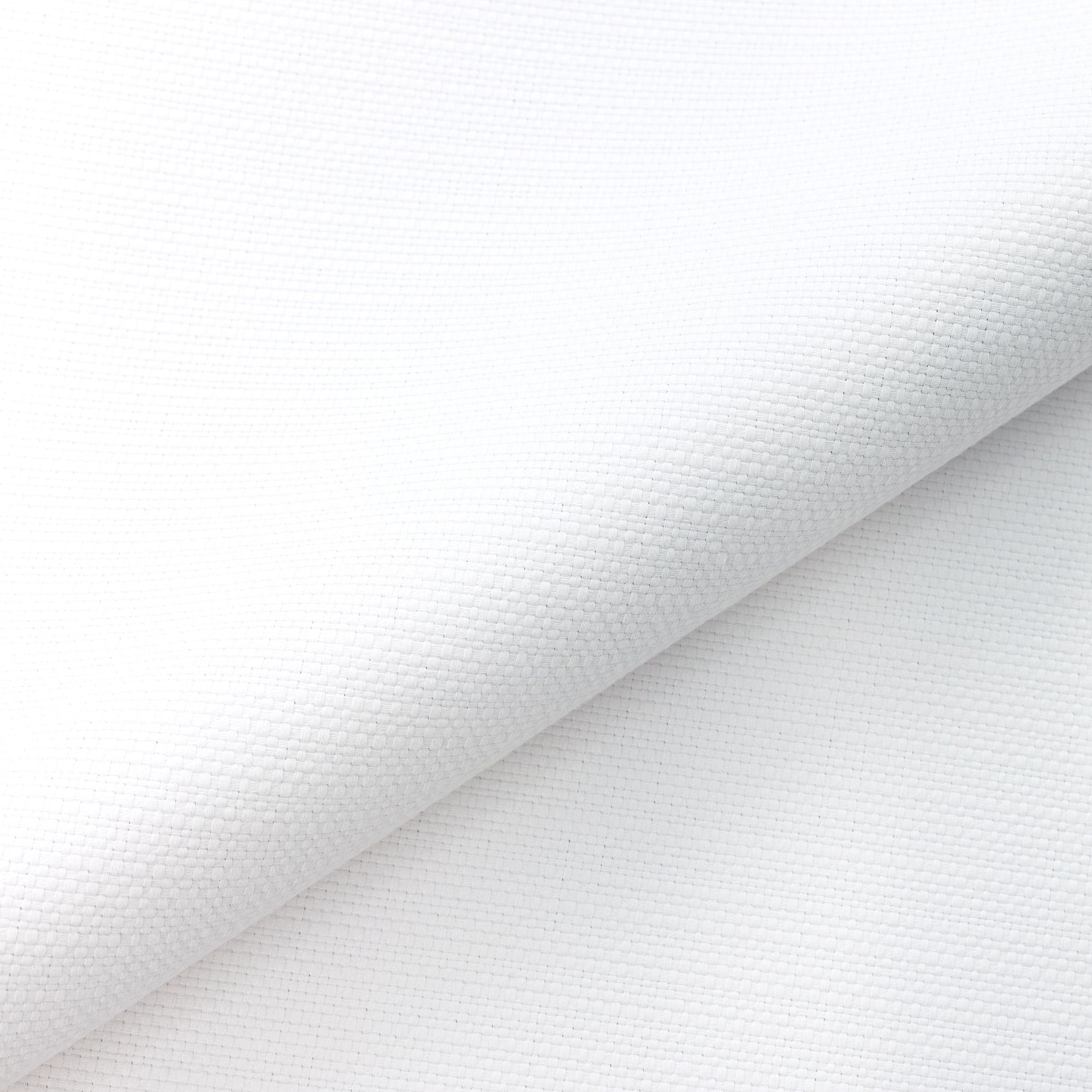 Close shot texture image of Bright chalk white outdoor safe woven textile with fine weave