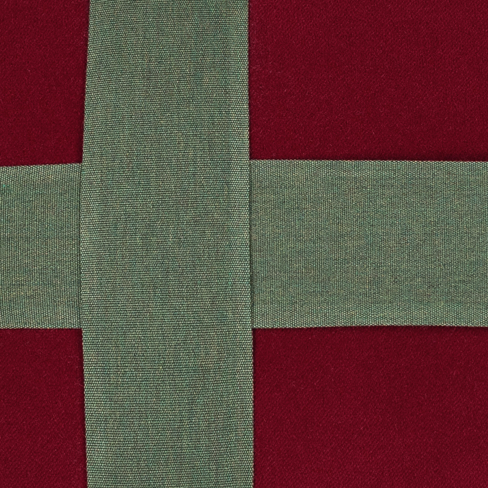 Detail image of Ruby velvet lumbar pillow with green banding for seasonal décor