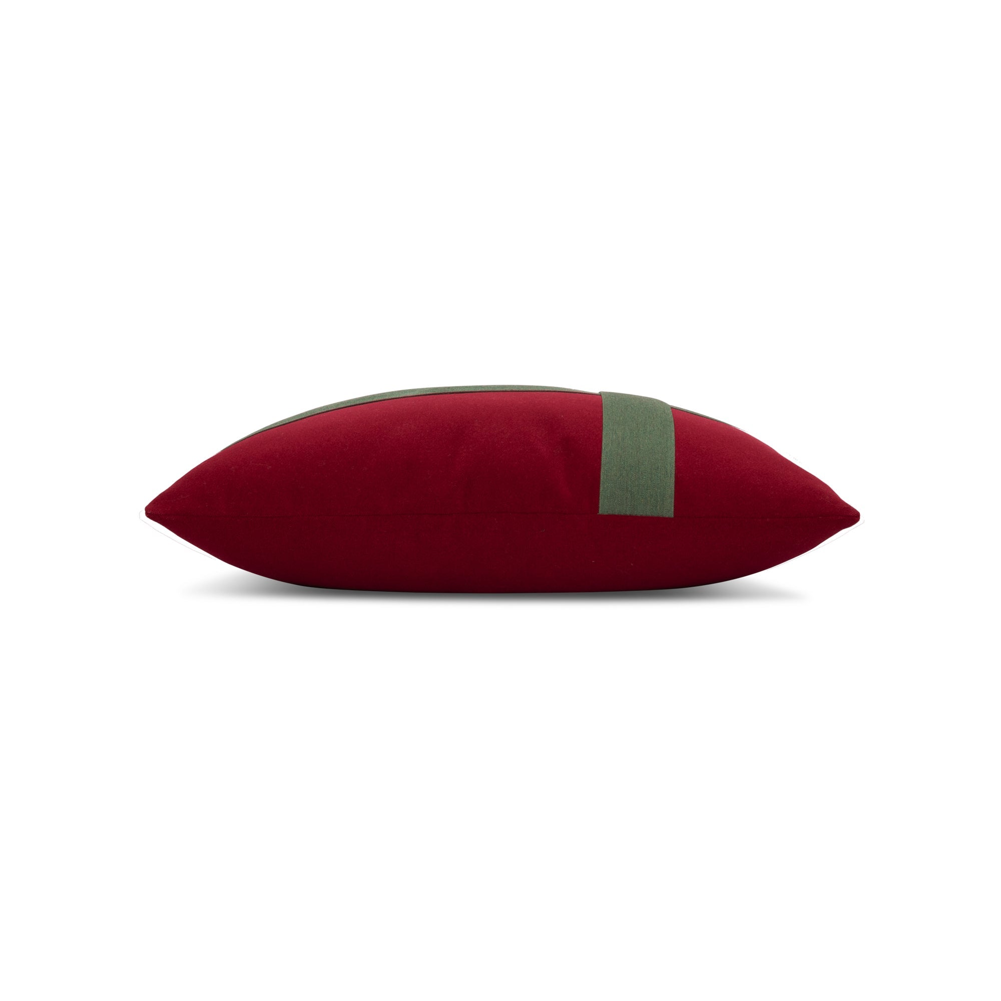 Side image of Ruby velvet lumbar pillow with green banding for seasonal décor