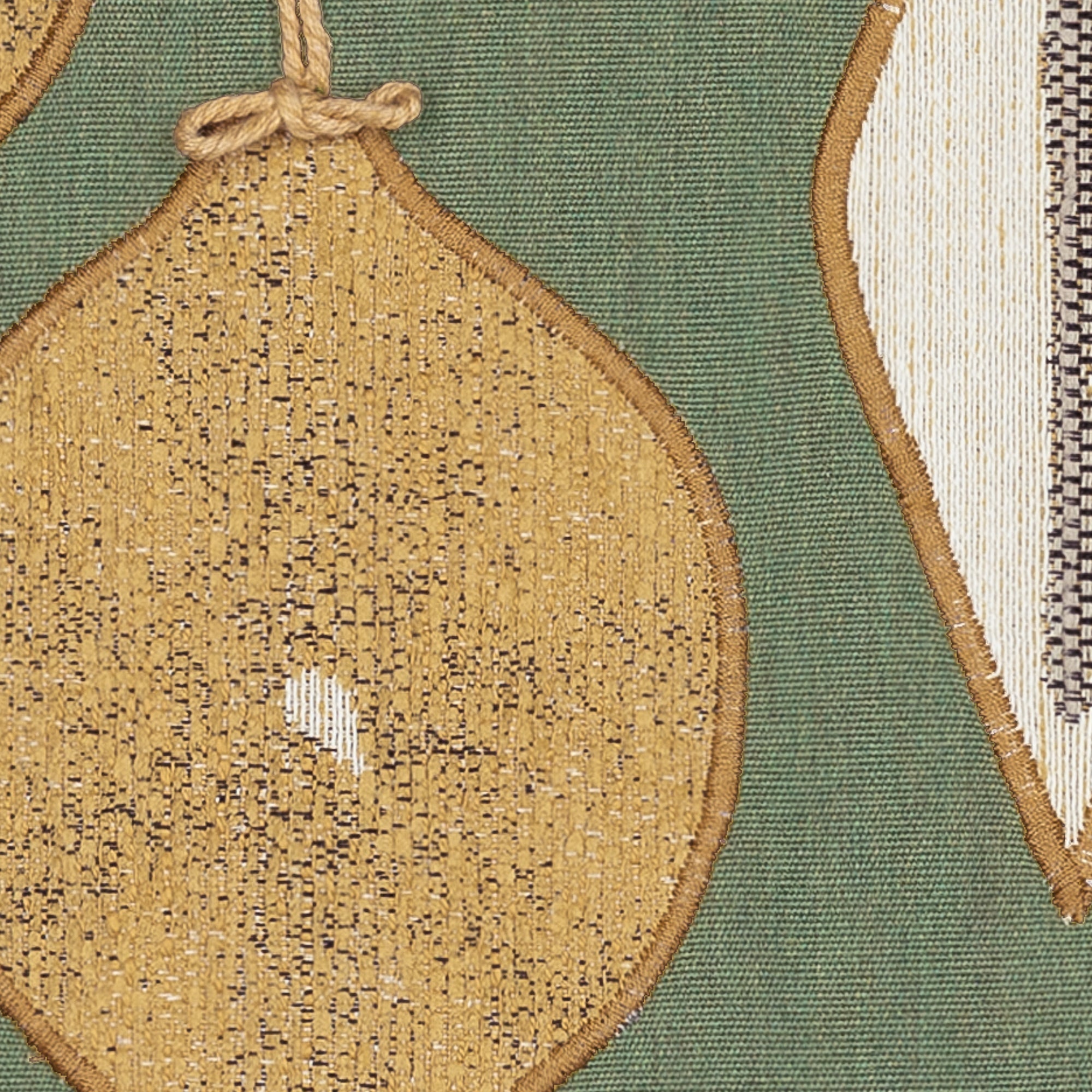Detail image of Green pillow with gold ornament hand stitched details in square size for holiday and seasonal indoor and outdoor decor
