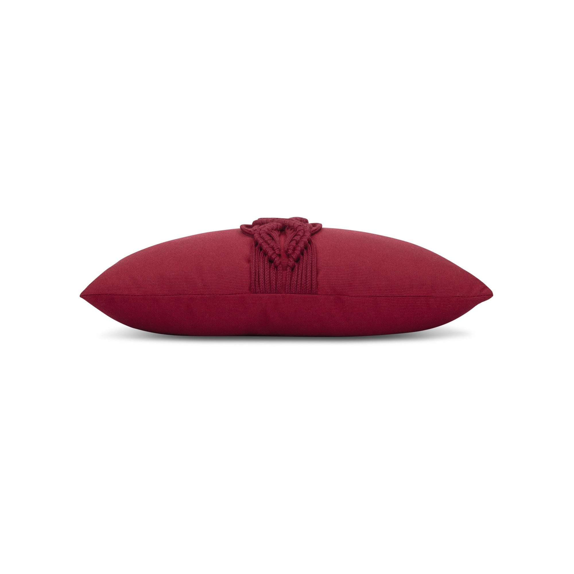 Side image of Red outdoor pillow with solid texture, lumbar size for vibrant holiday accents