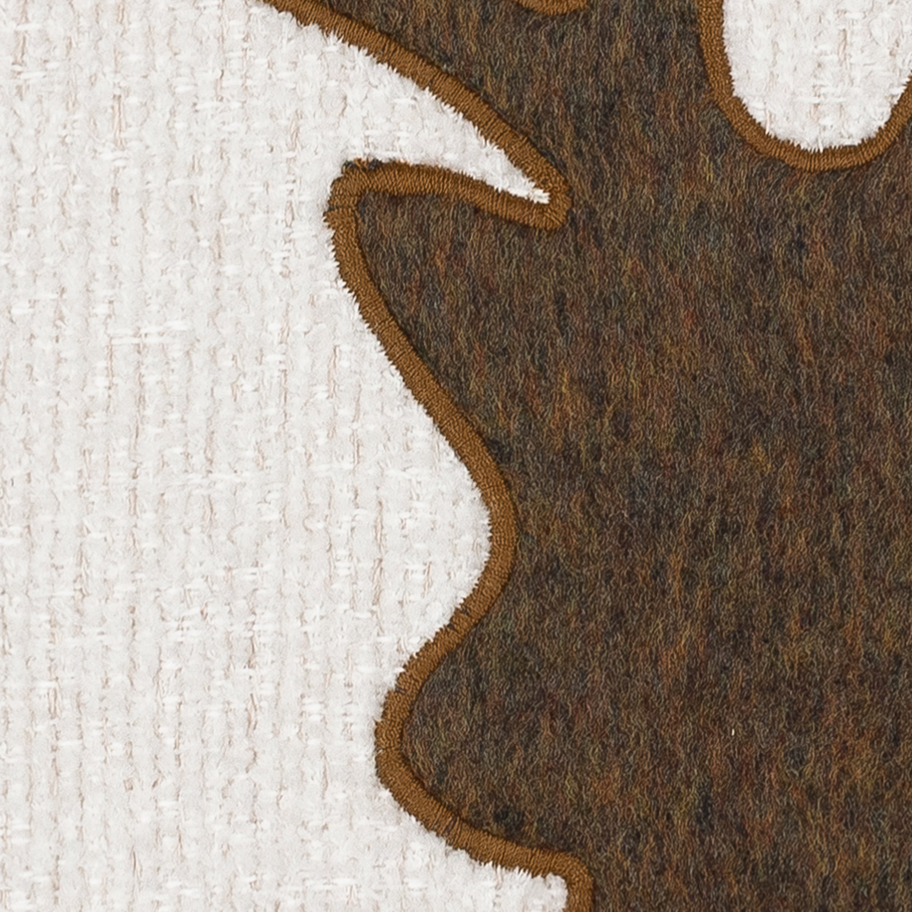 Detail image of White outdoor pillow with deer silhouette, square size for festive outdoor styling by Elaine Smith