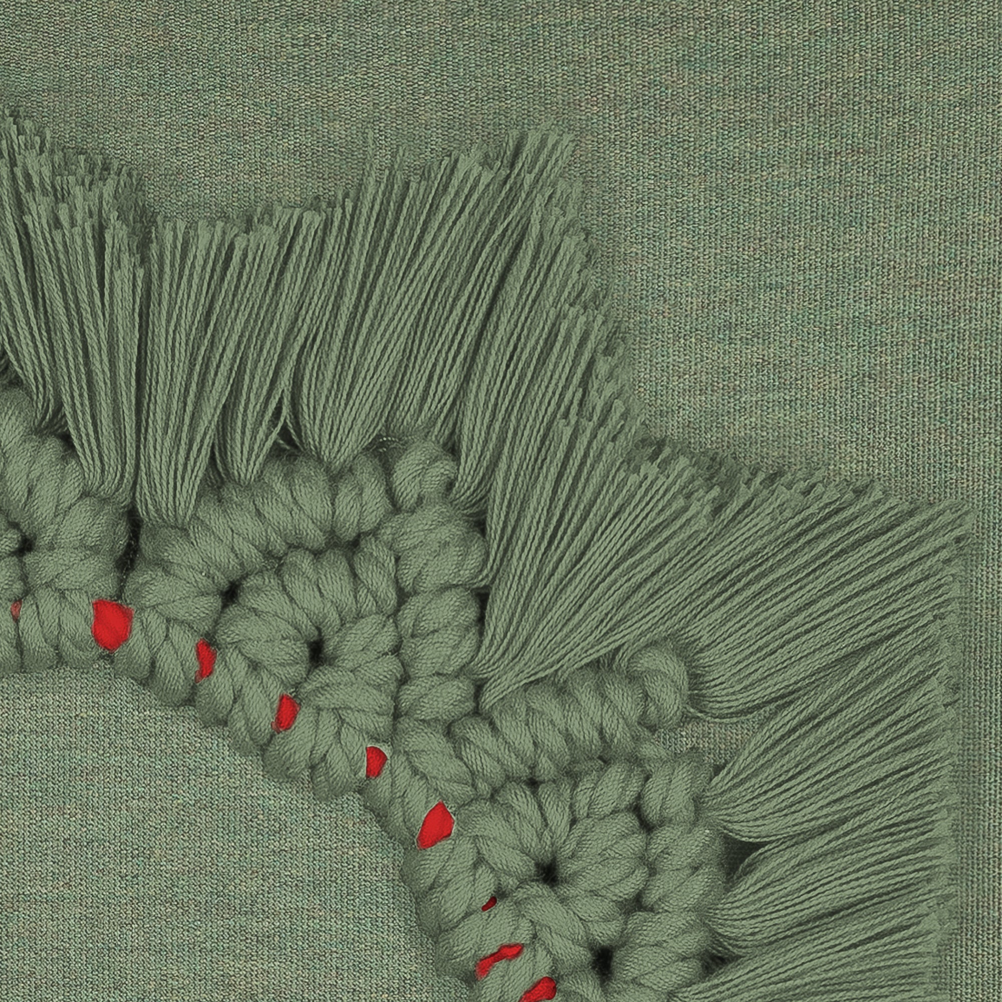 Detail image of Green wreath motif pillow for seasonal indoor and outdoor décor.