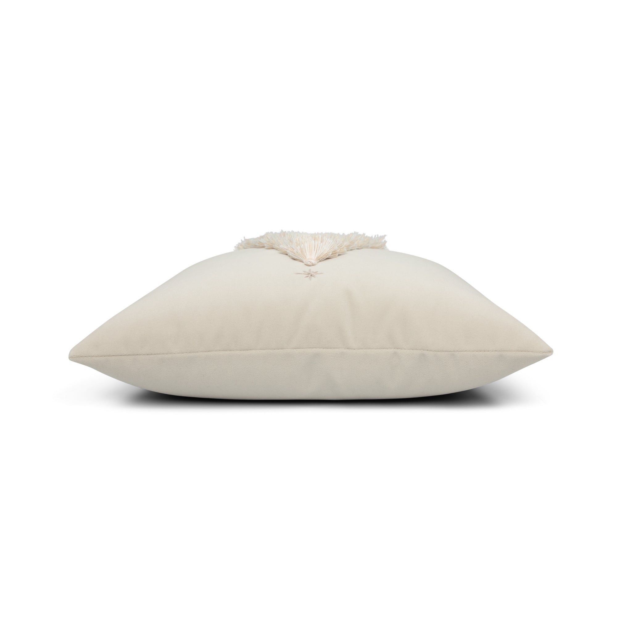 Side image of Ivory outdoor pillow with holiday tree motif square size for decorative holiday patio decor