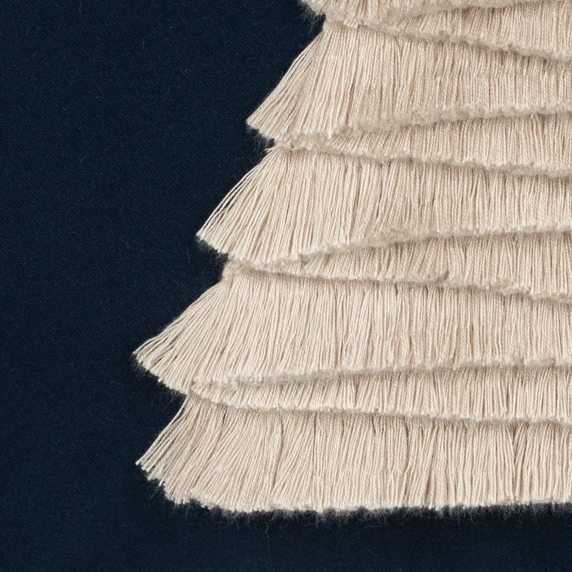 Detail image of Navy outdoor pillow with holiday tree motif square size for festive patio decor