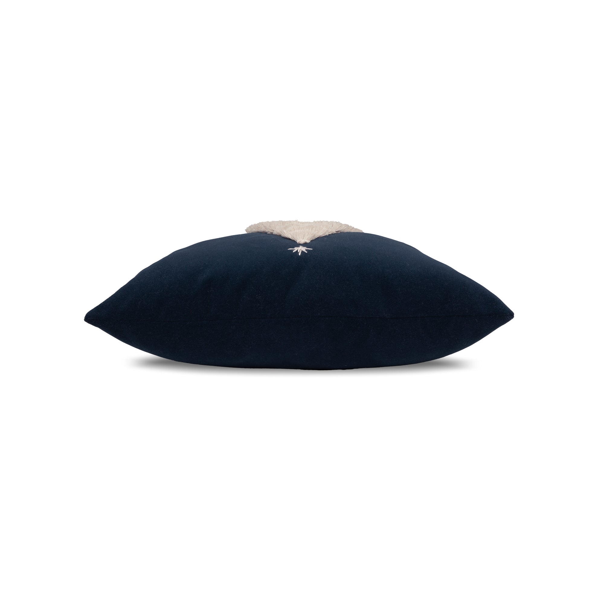 Side image of Navy outdoor pillow with holiday tree motif square size for festive patio decor