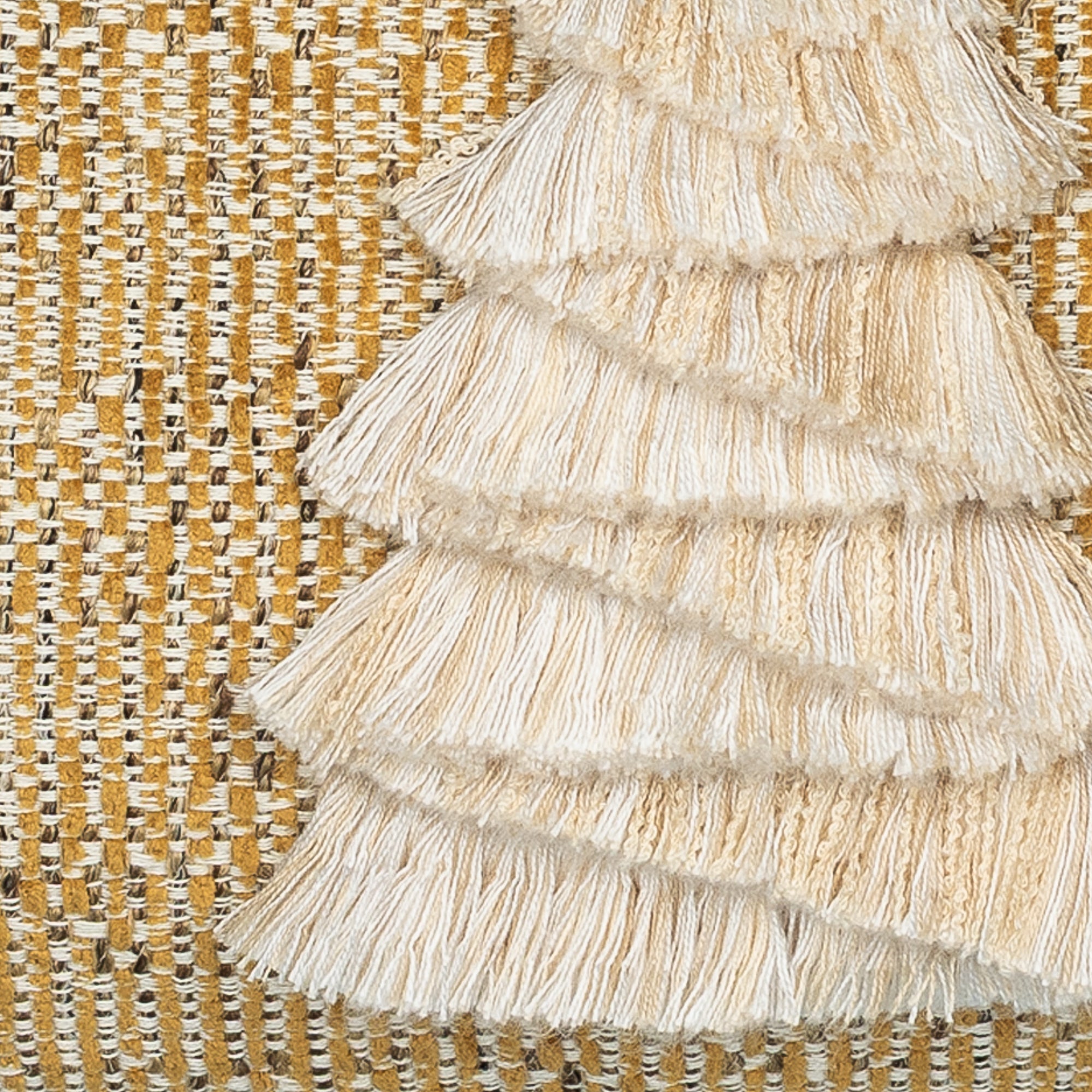 Detail image of Gold textured outdoor pillow with holiday tree motif lumbar size for seasonal patio decor by Elaine Smith