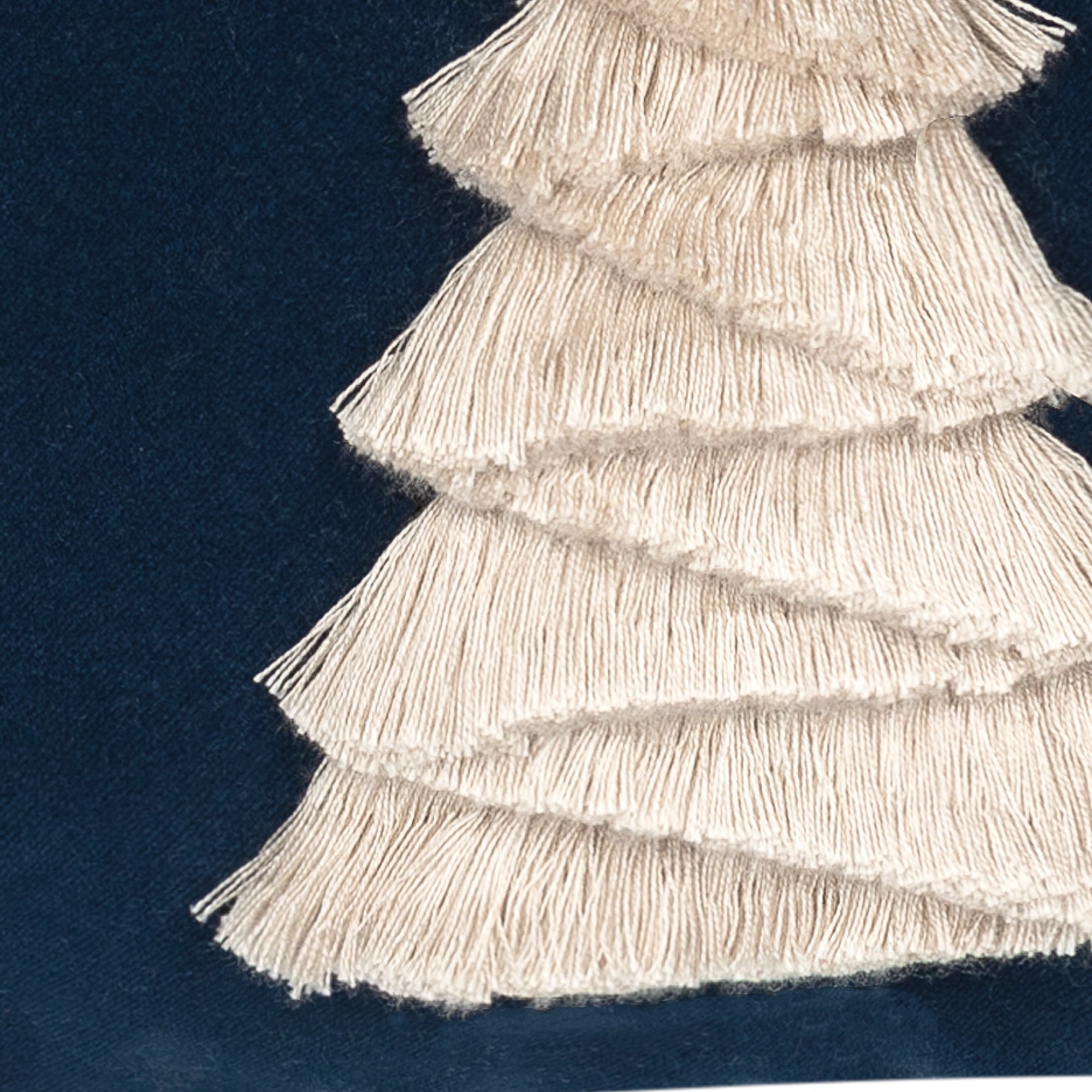 Detail image of Navy outdoor pillow with holiday tree motif lumbar size for festive patio decor