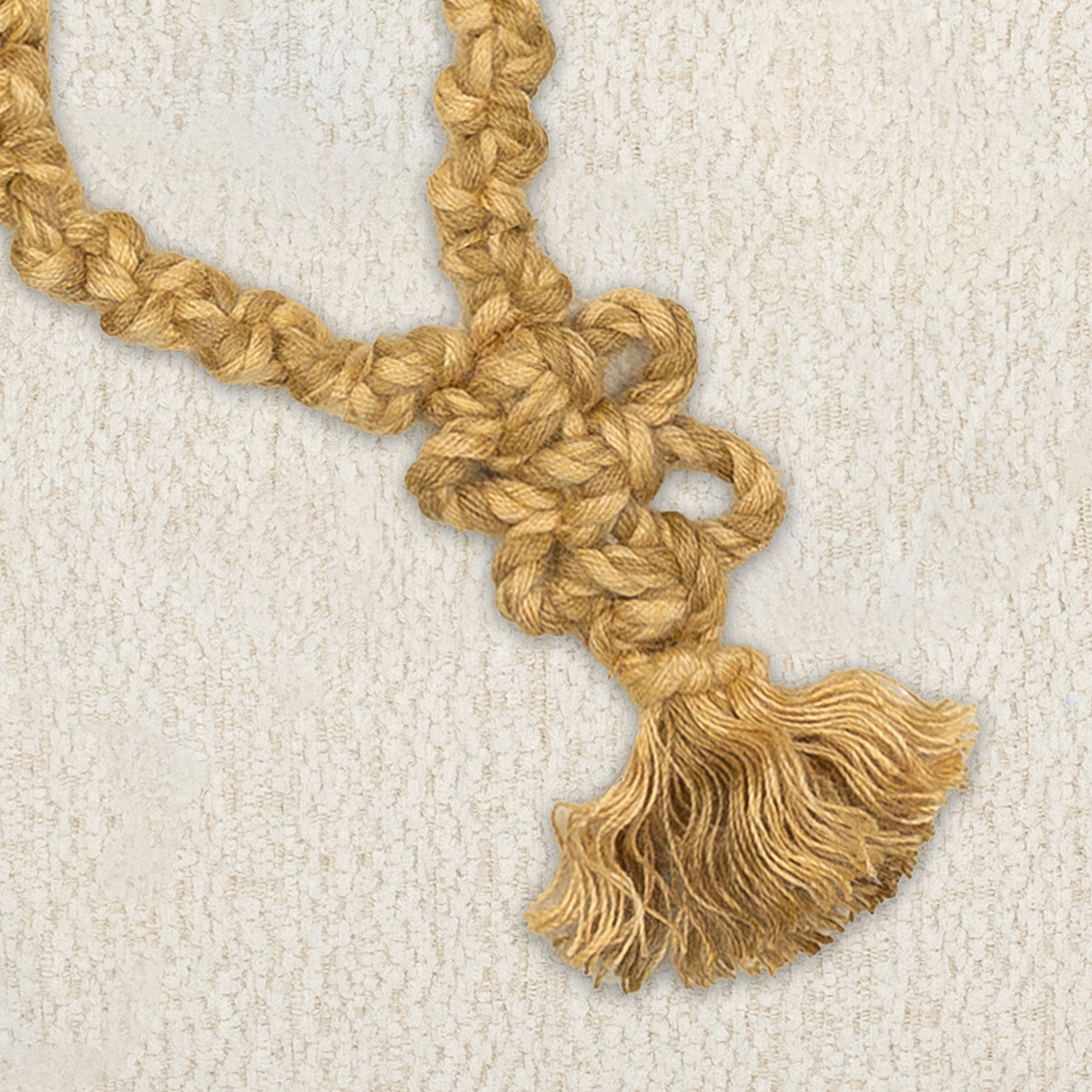 Detail image of Ivory and gold snowflake motif pillow square size for seasonal indoor and outdoor decor by Elaine Smith